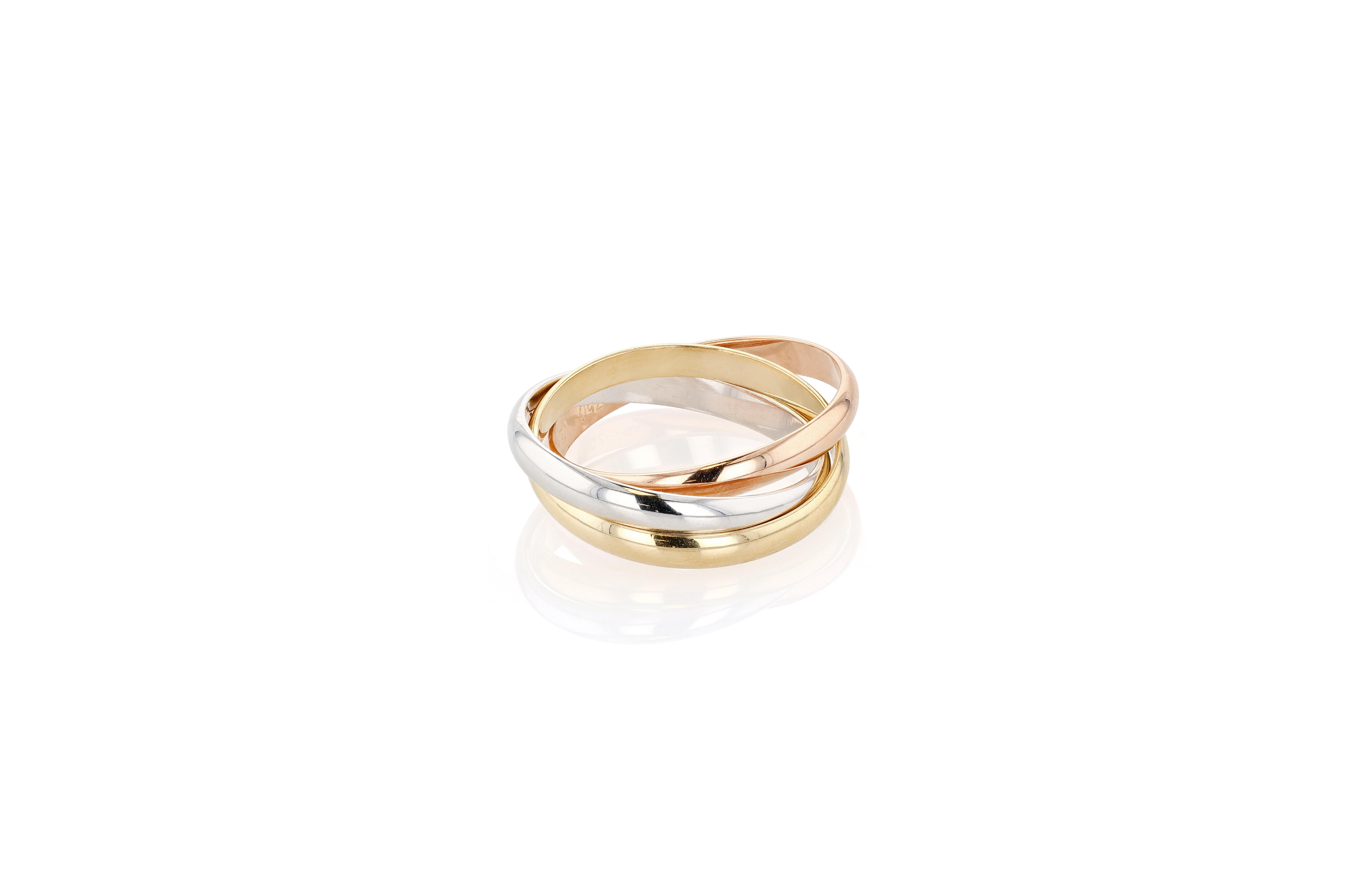 Women's or Men's Cartier Trinity Ring in Yellow, White, and Rose Gold Web Store Description