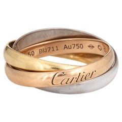 Cartier, petite bague Trinity modèle 18 carats à anneau en or tricolore, taille 50, bijou d'occasion