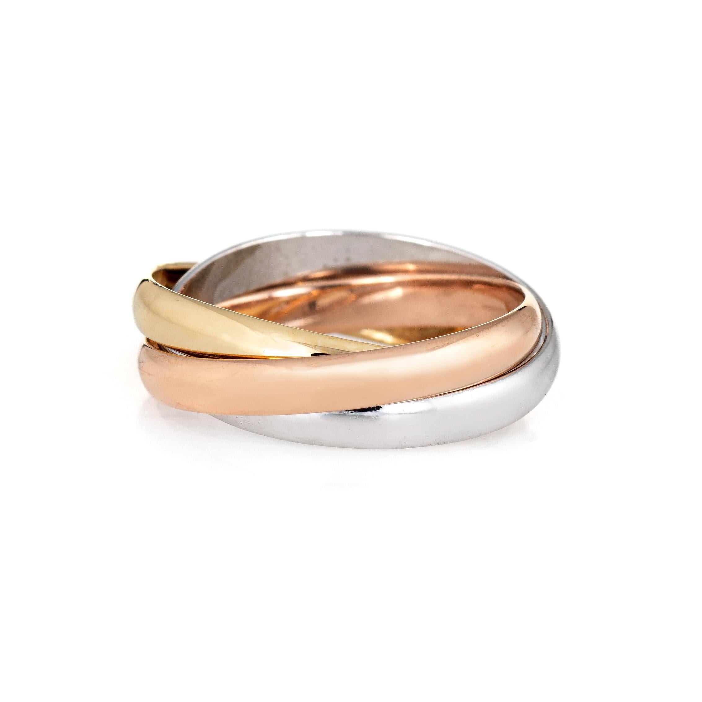 Pre owned Cartier Trinity 3 band ring crafted in 18 karat yellow, rose and white gold.  

The ring features three bands measuring 2.8mm each (small model).

The ring is in very good condition and was recently professionally cleaned and polished. No