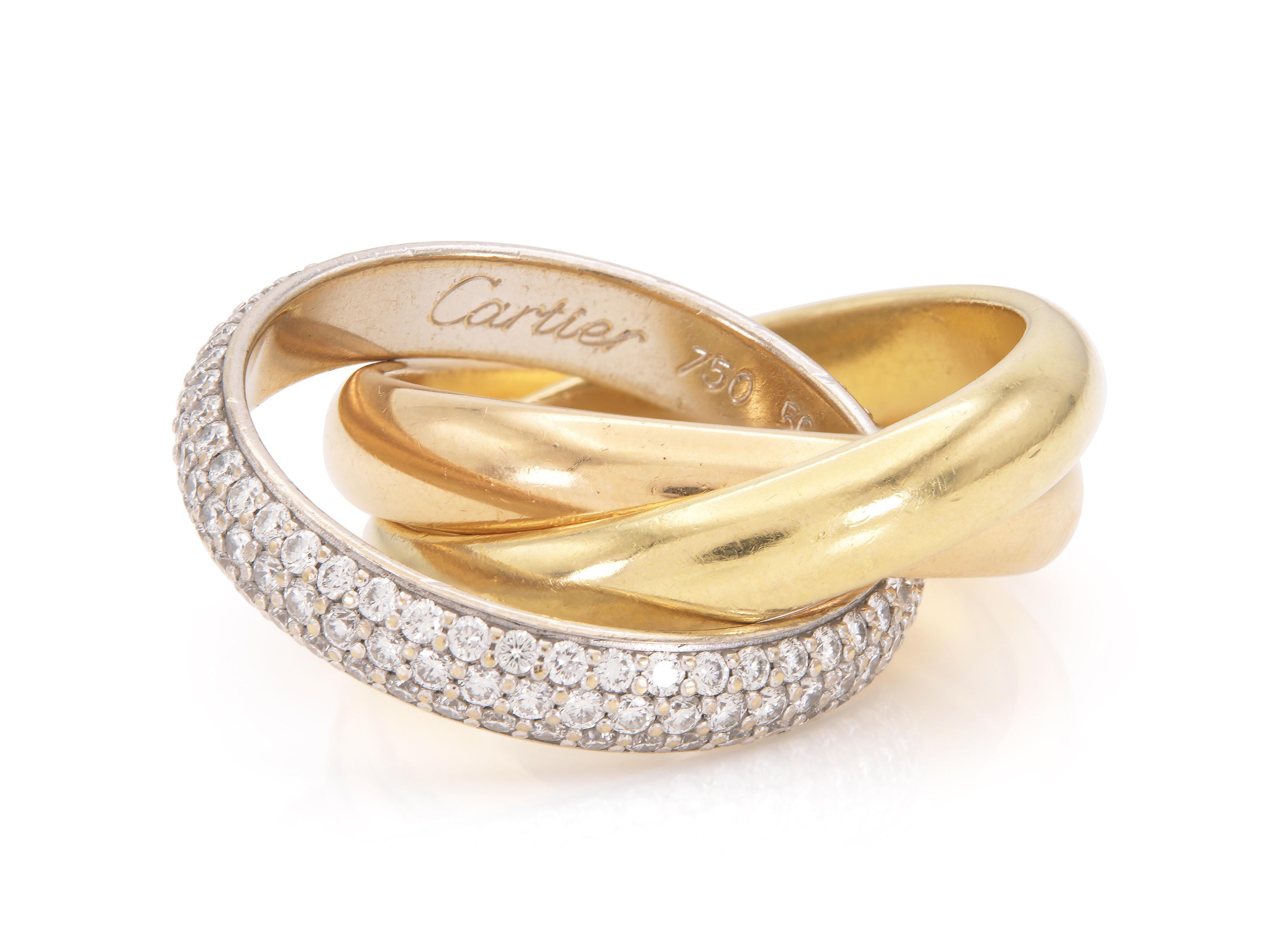 Finely crafted in 18k yellow, white, and rose gold with Round Brilliant cut Diamonds.
Signed by Cartier, from their Trinity collection.
Classic size, each band measures 4 mm
Size 50 (US 5 1/4)