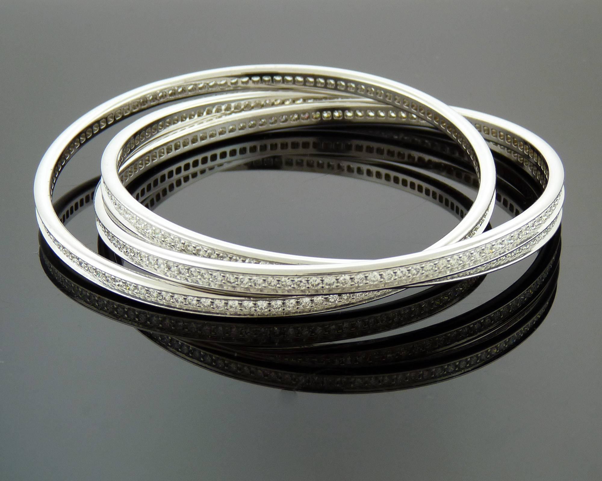 Cartier Trinity Rolling Diamond White Gold Bangle Bracelets In Excellent Condition In New York, NY