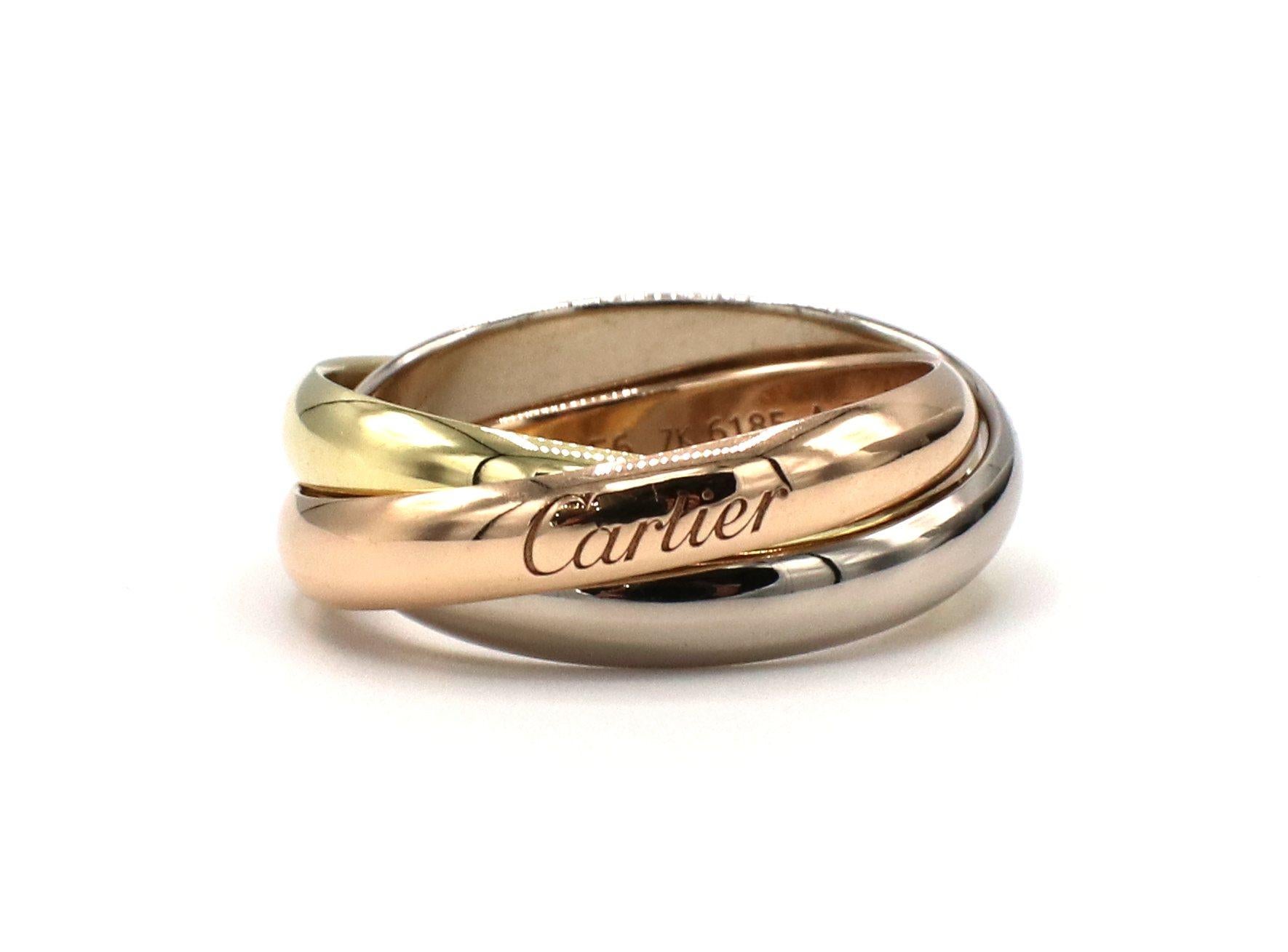 Cartier Trinity Rolling Ring Rose Yellow White Gold Medium Model
Metal: 18k white, rose, yellow gold
Weight: 9.14 grams
Width: Each band is 3.5mm
Size: 56 (7.5 US)
Notes: Box & papers included 
Retail: $1,420 USD