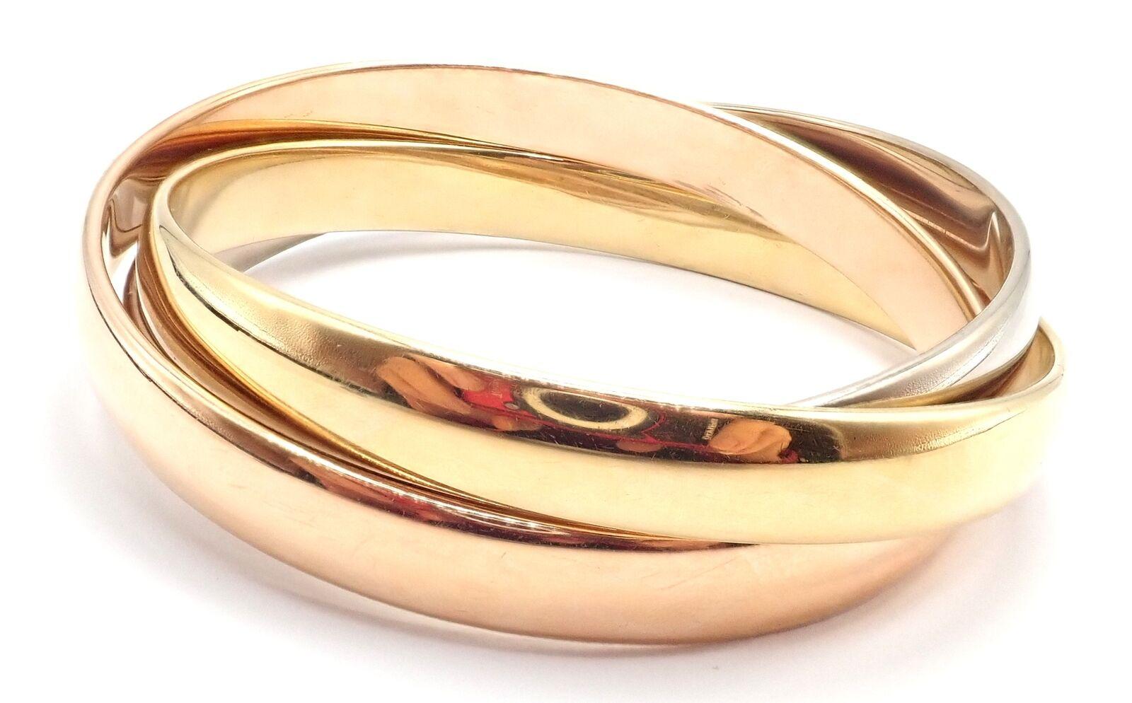 Cartier Trinity Bracelet jonc grand modèle en or tricolore 101,5 grammes en vente 1