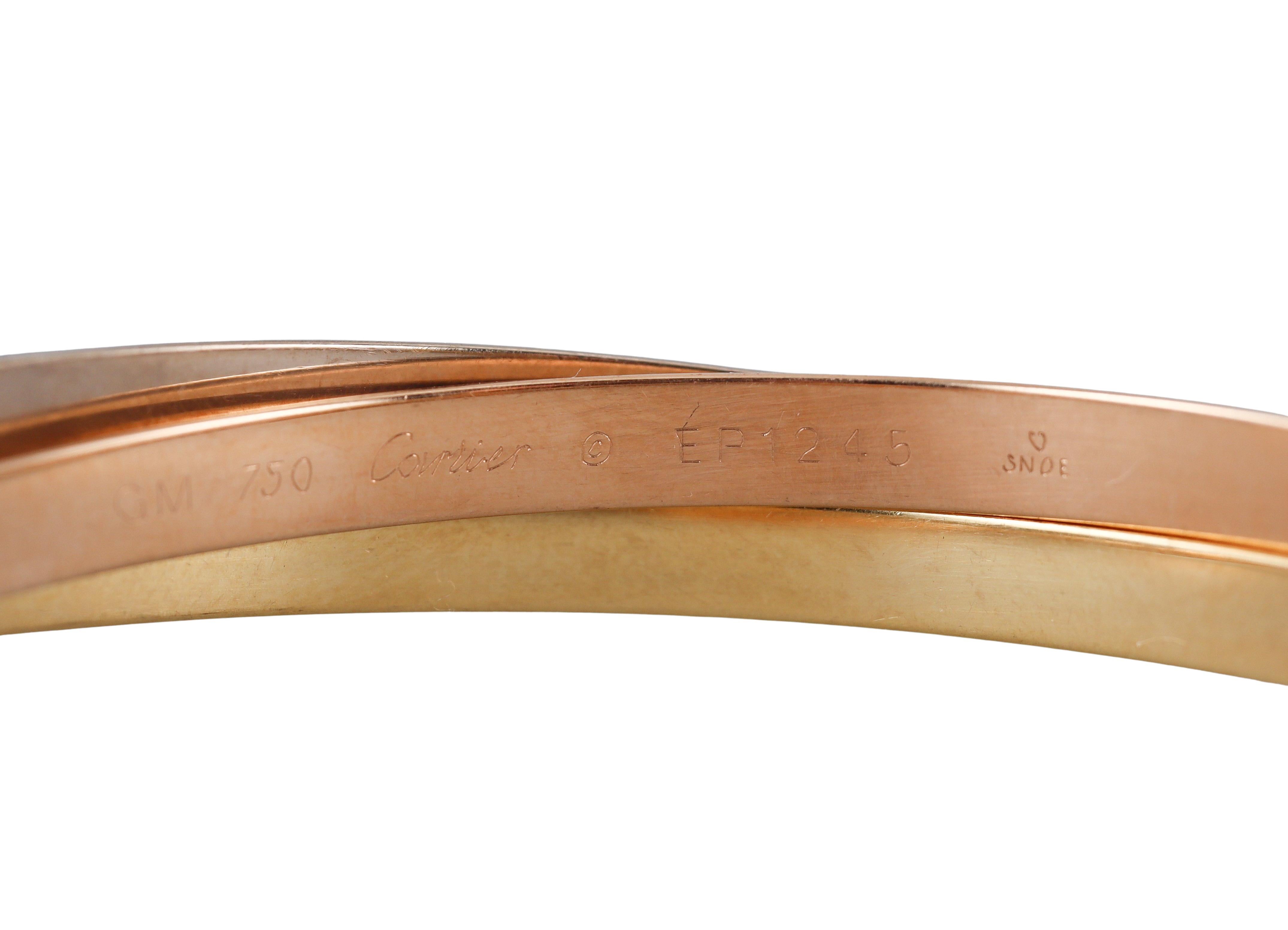 Cartier Trinity Rose Yellow White Gold Bangle Bracelet In Excellent Condition For Sale In New York, NY