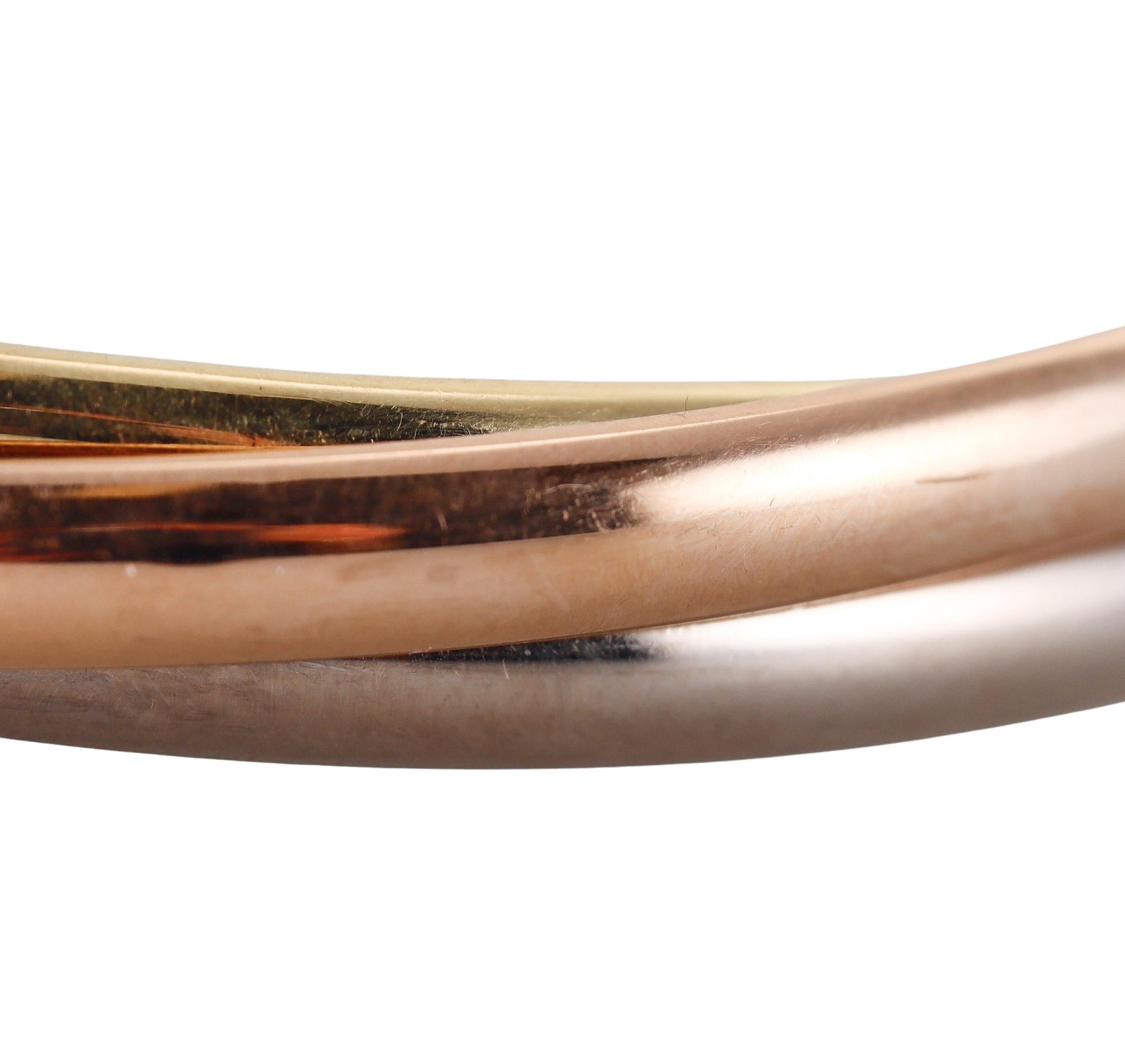 Women's Cartier Trinity Rose Yellow White Gold Bangle Bracelet For Sale