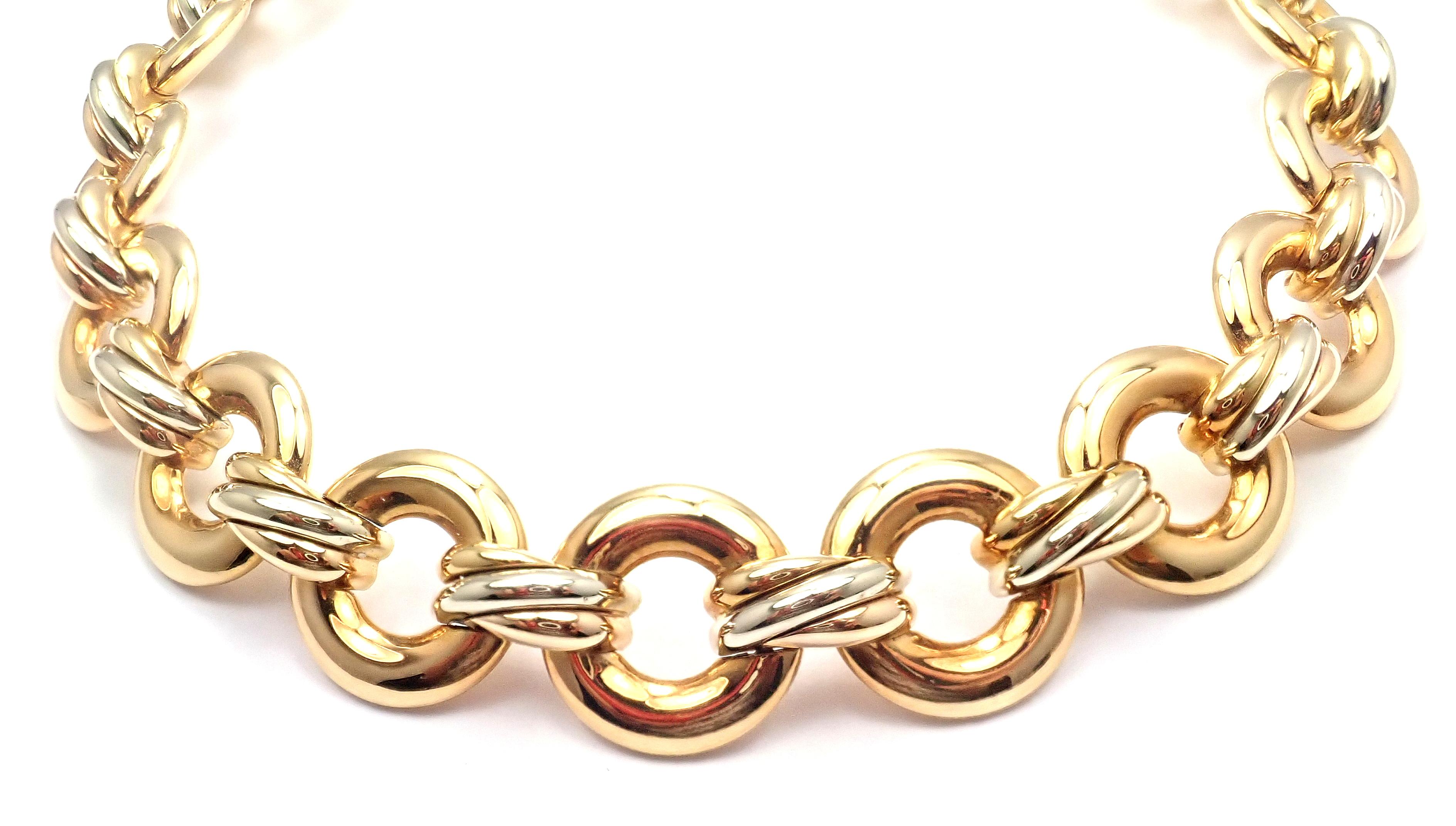 18k Multi Color Gold Round Link Trinity Choker Necklace by Cartier. 
Details: 
Length: 16''
Width: 21mm
Weight: 131.4 grams
Stamped Hallmarks: Cartier,  750,  1996, D(*Serial Omitted*)
*Free Shipping within the United States* 
YOUR PRICE: