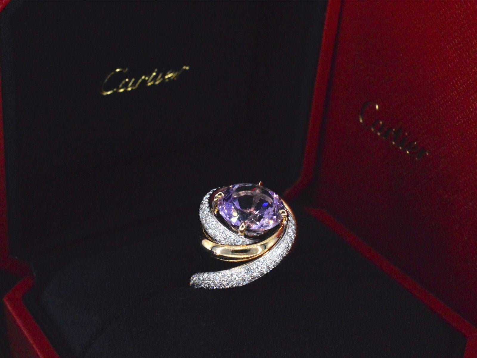 This Cartier Trinity Ruban Amethyst ring is a true masterpiece, boasting a harmonious blend of elegance and luxury. Crafted with precision and finesse, the 18.7-gram ring is made of 18k gold 750, exemplifying Cartier's commitment to quality.

The
