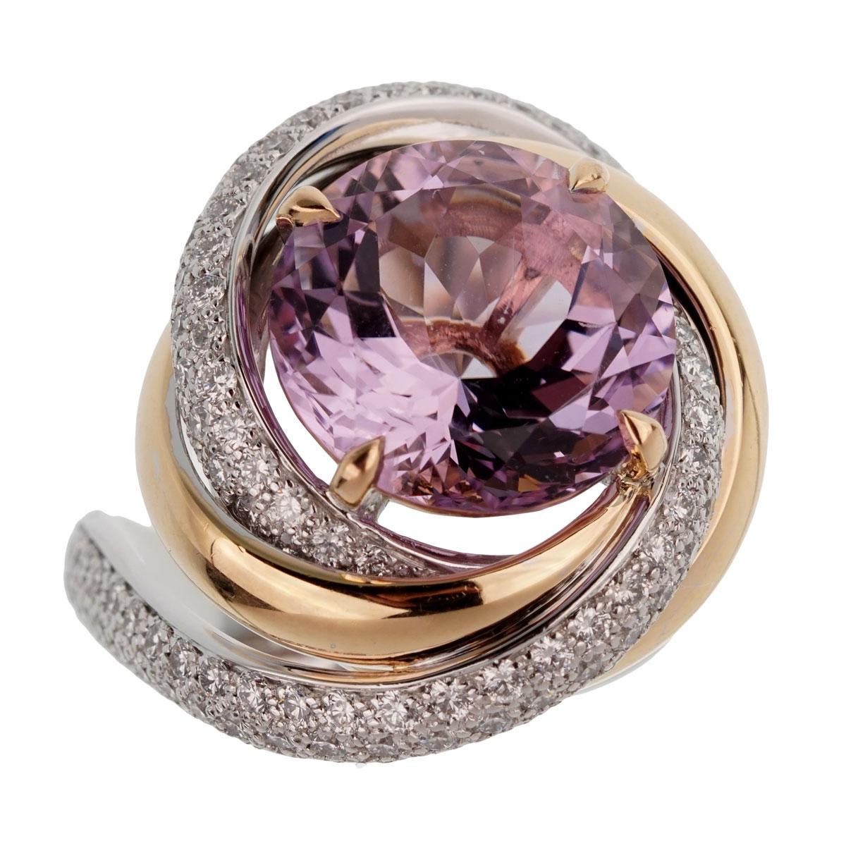 A magnificent Cartier Trinity Ruban Amethyst ring adorned with the finest round brilliant Cartier diamonds draping an amethyst.

Cartier Size 55 / US 6, and can be resized