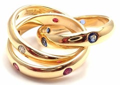 Anillo Cartier Trinity Rubí Zafiro Diamante Oro Amarillo
