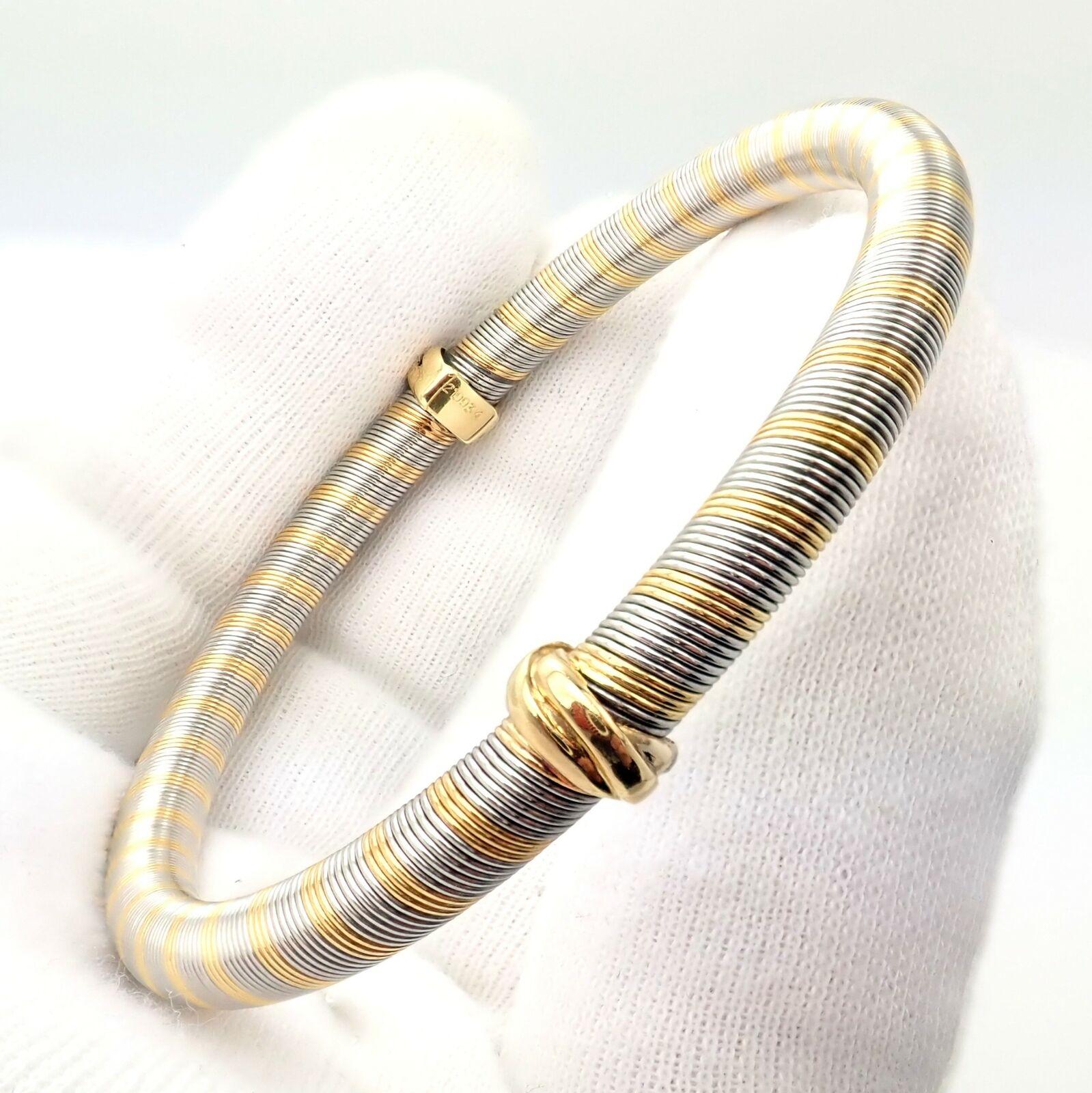 Bracelet trinitaire en or tricolore (jaune, blanc, rose) et acier inoxydable 18k par Cartier. 

Détails : 
Poids : 28 grammes
Longueur : 7.5