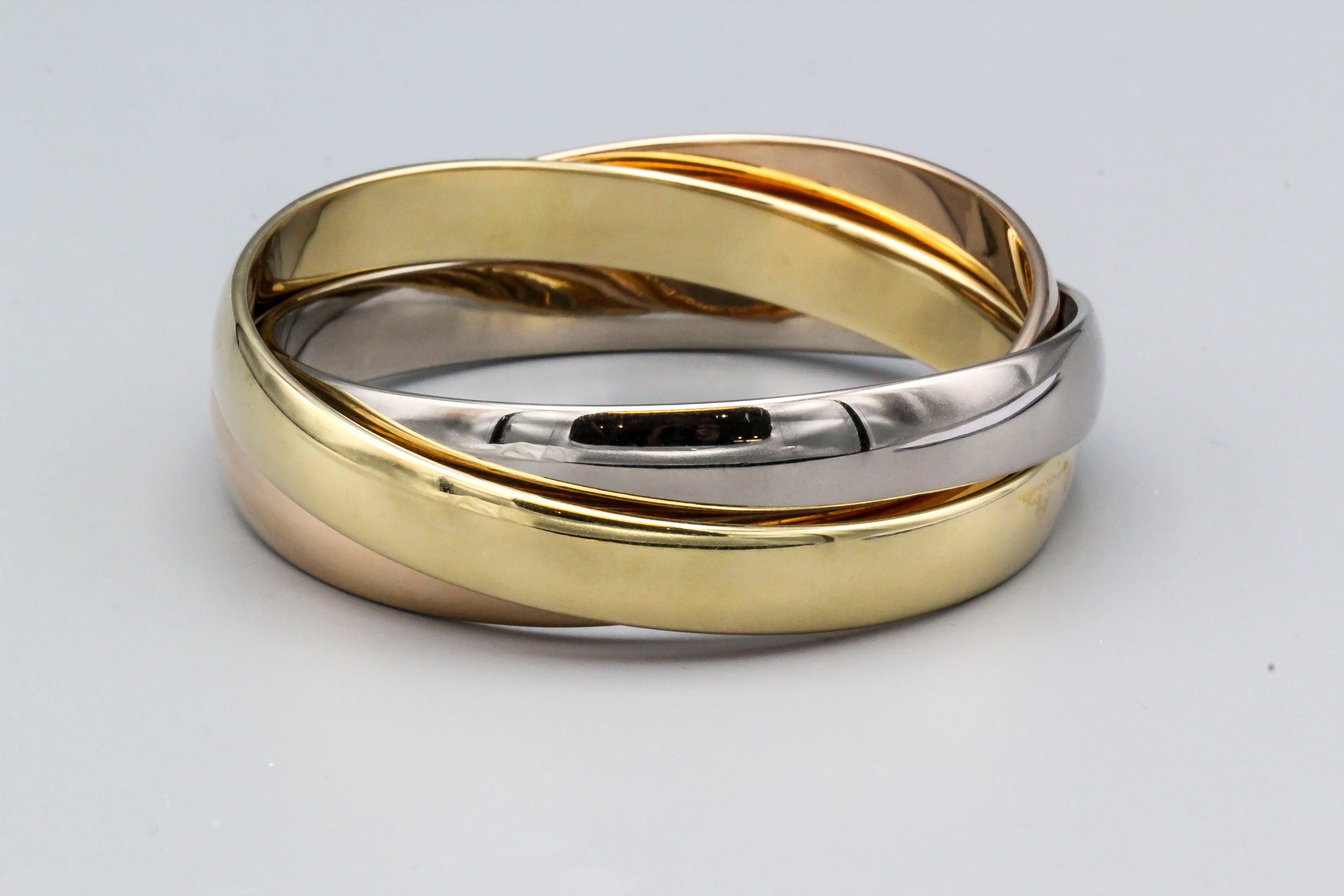 Fine 18K white, yellow and pink gold bangle bracelet from the 