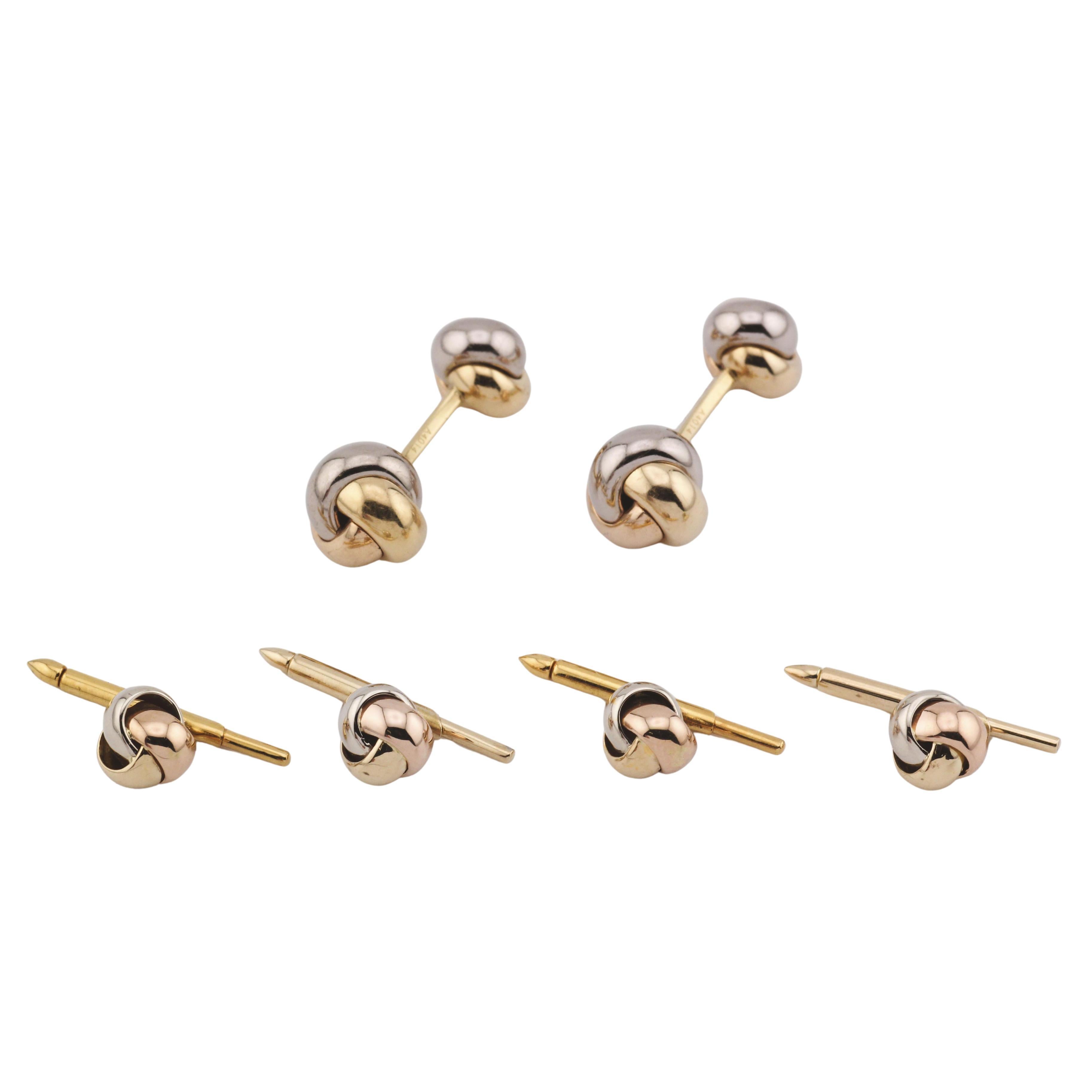 Cartier Trinity, clous de manchette nœuds tricolores en or 18 carats en vente