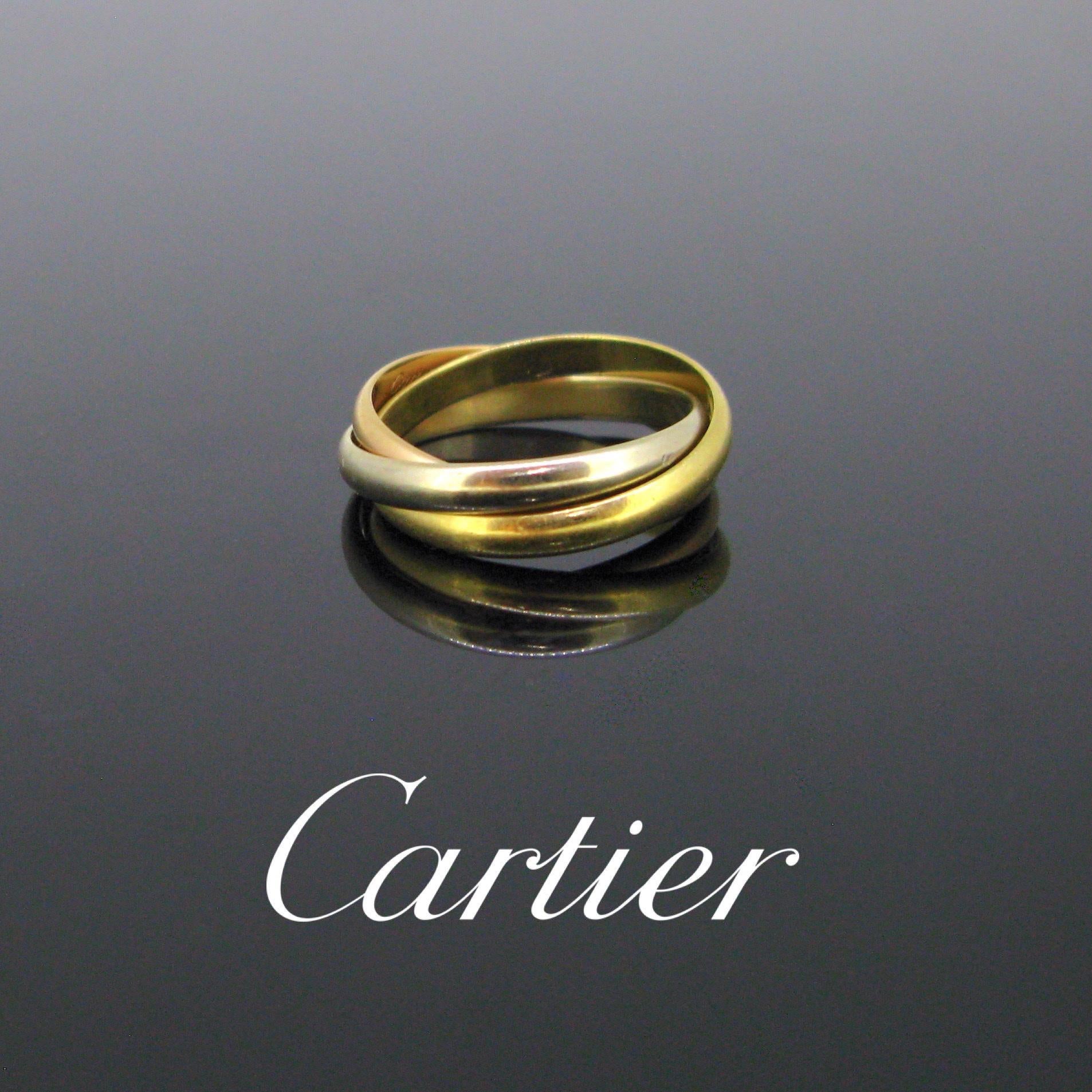 Weight:	4.8 gr


Metal:		18kt yellow, white, rose gold


Signature:	Cartier Paris 750


Ring size:	51 - 5 ½ - L 


Condition:	Very Good


Hallmarks:	French, eagle’s head and maker’s mark on each band


Comments: 	This timeless ring comprises of 3