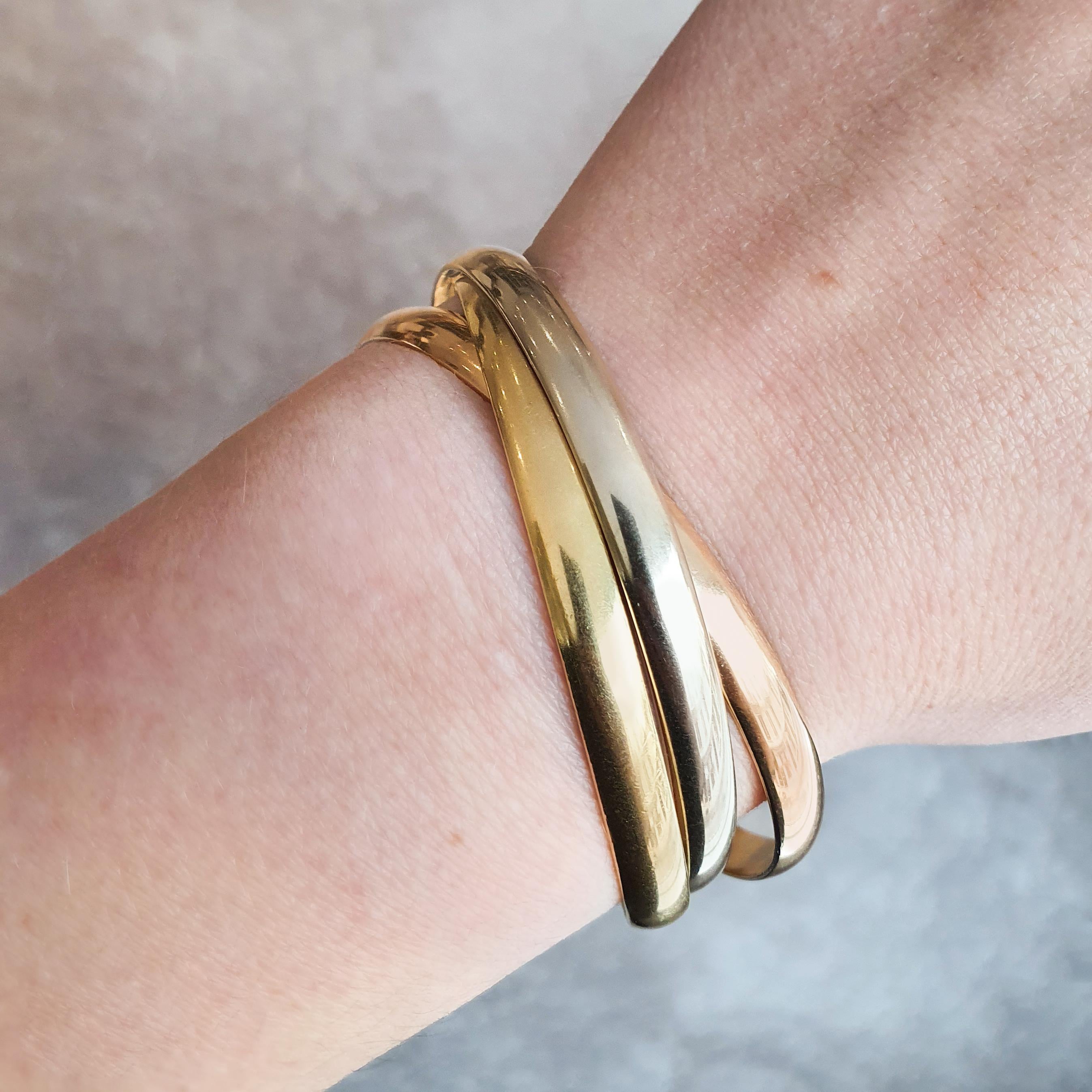 Cartier Trinity Three Gold 18K Bangle Bracelet In Excellent Condition For Sale In Geneva, CH