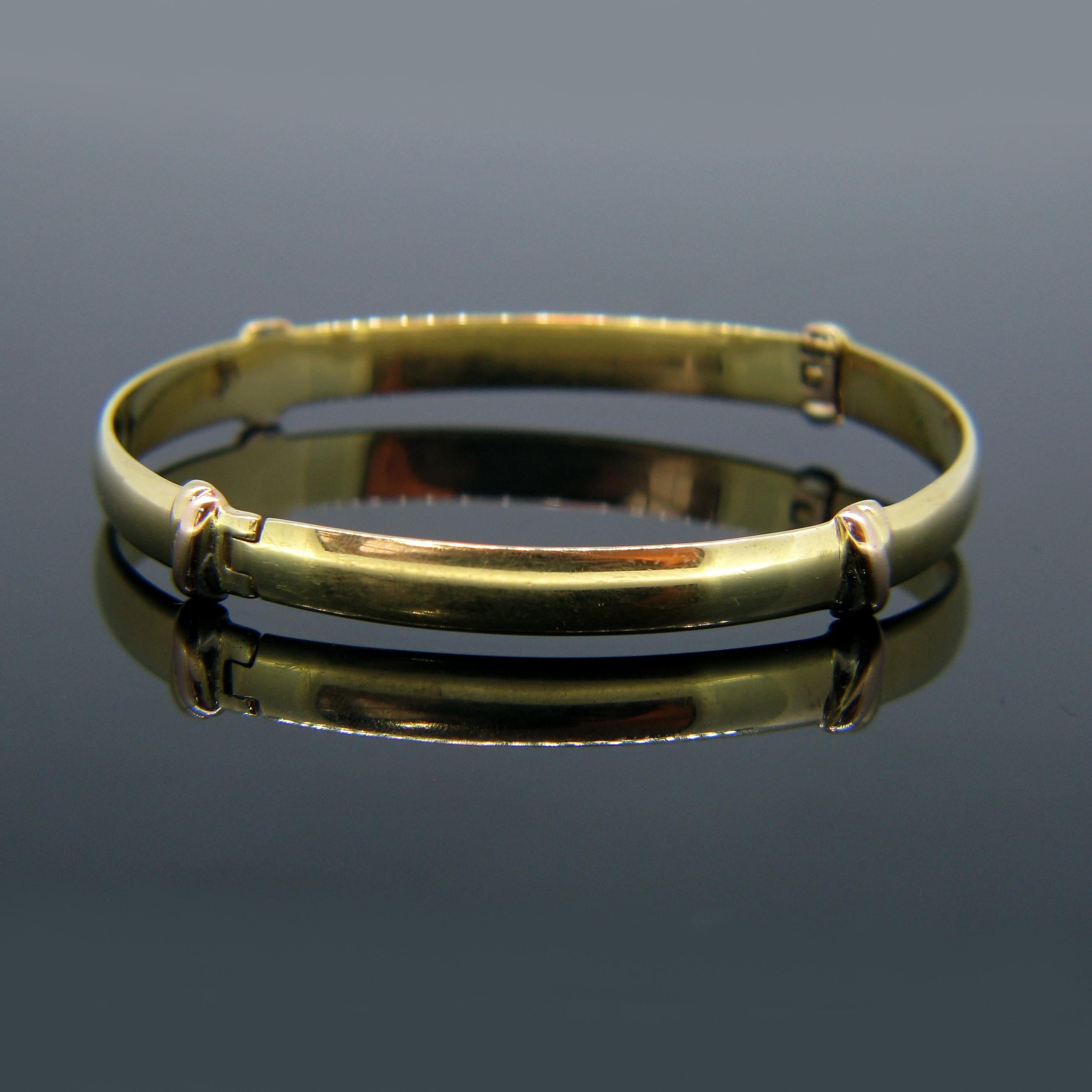 This bangle is signed Cartier and is numbered. It is made in 18kt white, yellow and rose gold with the famous Trinity colours from Cartier. It is a very comfortable bangle to wear every day. It opens in half from the