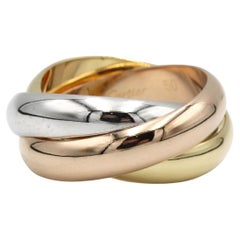 Anello Cartier "Trinity" a tre file in oro giallo, bianco e rosa 18 carati
