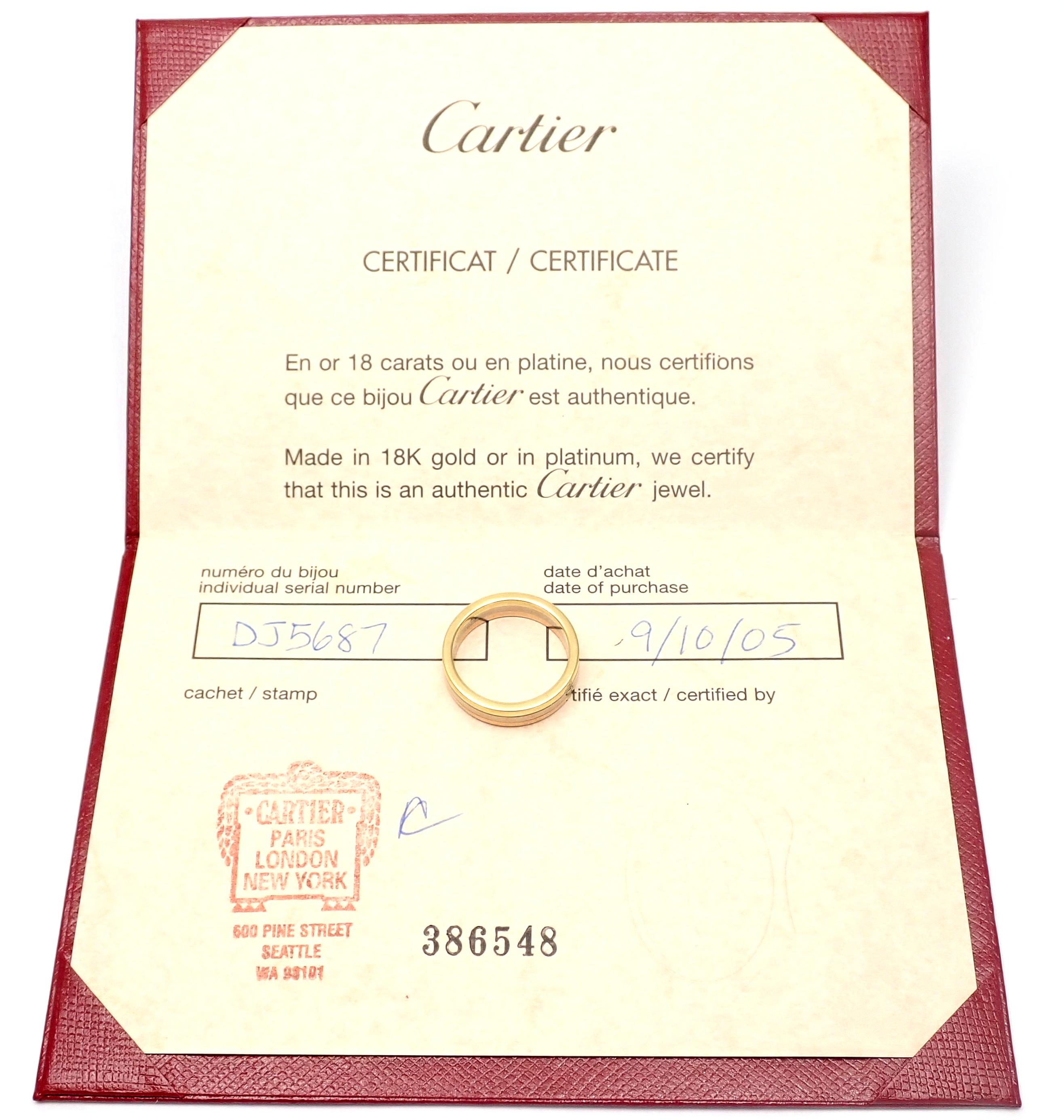 18k White, Yellow And Rose Gold Trinity Band Ring by Cartier. 
This ring comes with Cartier certificate of authenticity.
Details: 
Ring Size: European 51, US 5 3/4
Width: 5mm each band
Weight: 6.4 grams
Stamped Hallmarks: Cartier 750 51 DJ5687
*Free