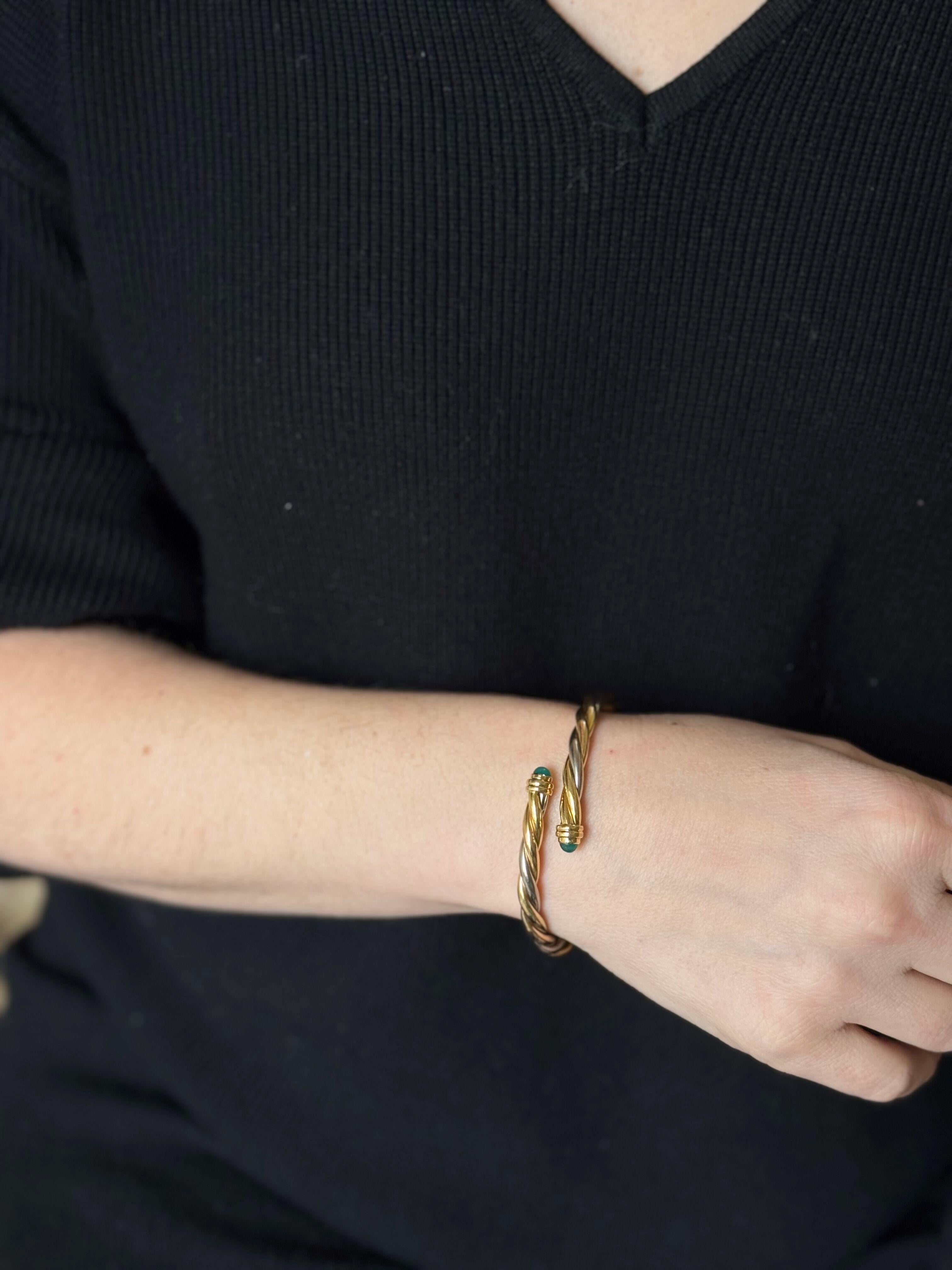 18k rose, white and yellow gold twisted Trinity bracelet by Cartier, with two chrysoprase cabochons on each end. Bracelet will fit an approx. 7.5