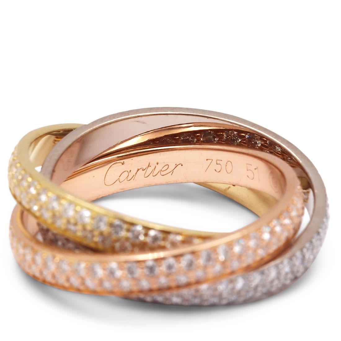 Authentic Cartier Trinity ring comprised of three interlocking mobile bands of 18 karat yellow, rose, and white gold. Each ring is encrusted with pave set high-quality round brilliant cut diamonds of an estimated 1.35 carats. Signed Cartier, 750,