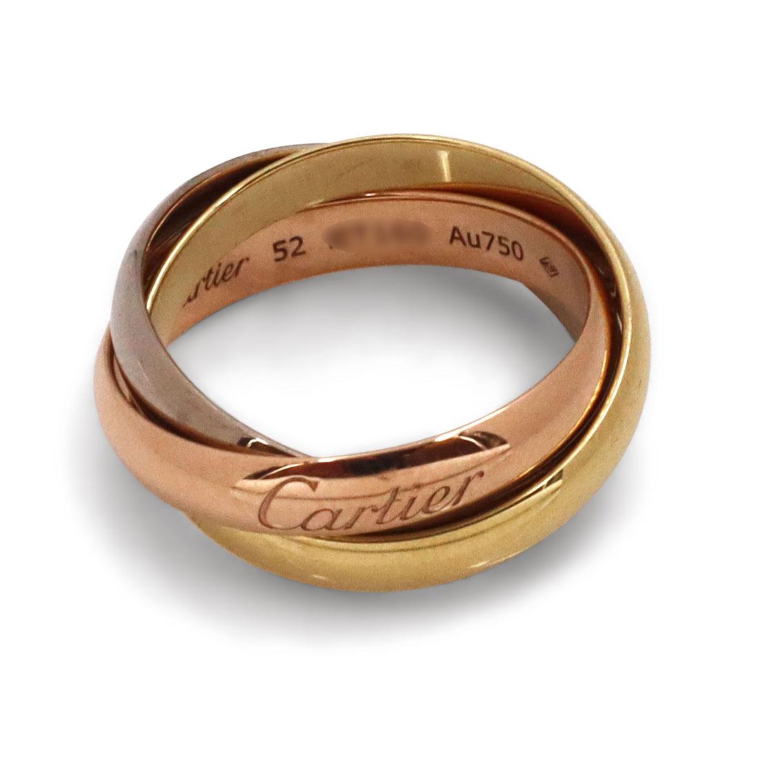 Authentic Cartier 'Trinity' ring comprised of interlocking bands of 18 karat yellow, rose, and white gold. Signed Cartier, 750, 52, with serial number. Ring size 52 (US 6). Each band measures 3.5mm wide. The ring is presented with the original box