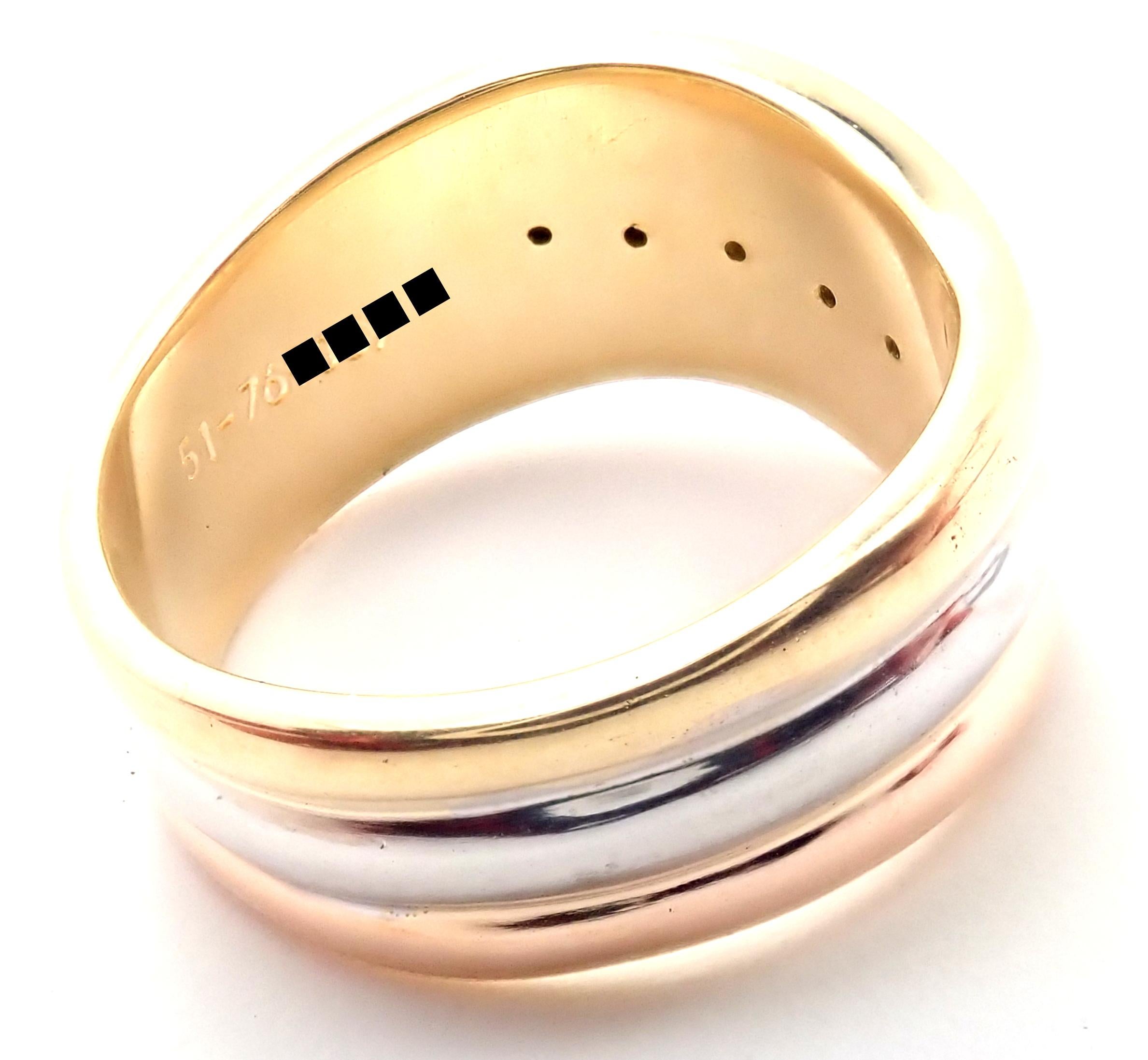 18k White, Yellow And Rose Gold Trinity Wide Band Ring by Cartier. 
Details: 
Ring Size: European 51 US 5 3/4
Width: 10mm
Weight: 6.7 grams
Stamped Hallmarks: Cartier 750 51-76XXXX(serial number omitted)
*Free Shipping within the United States* 