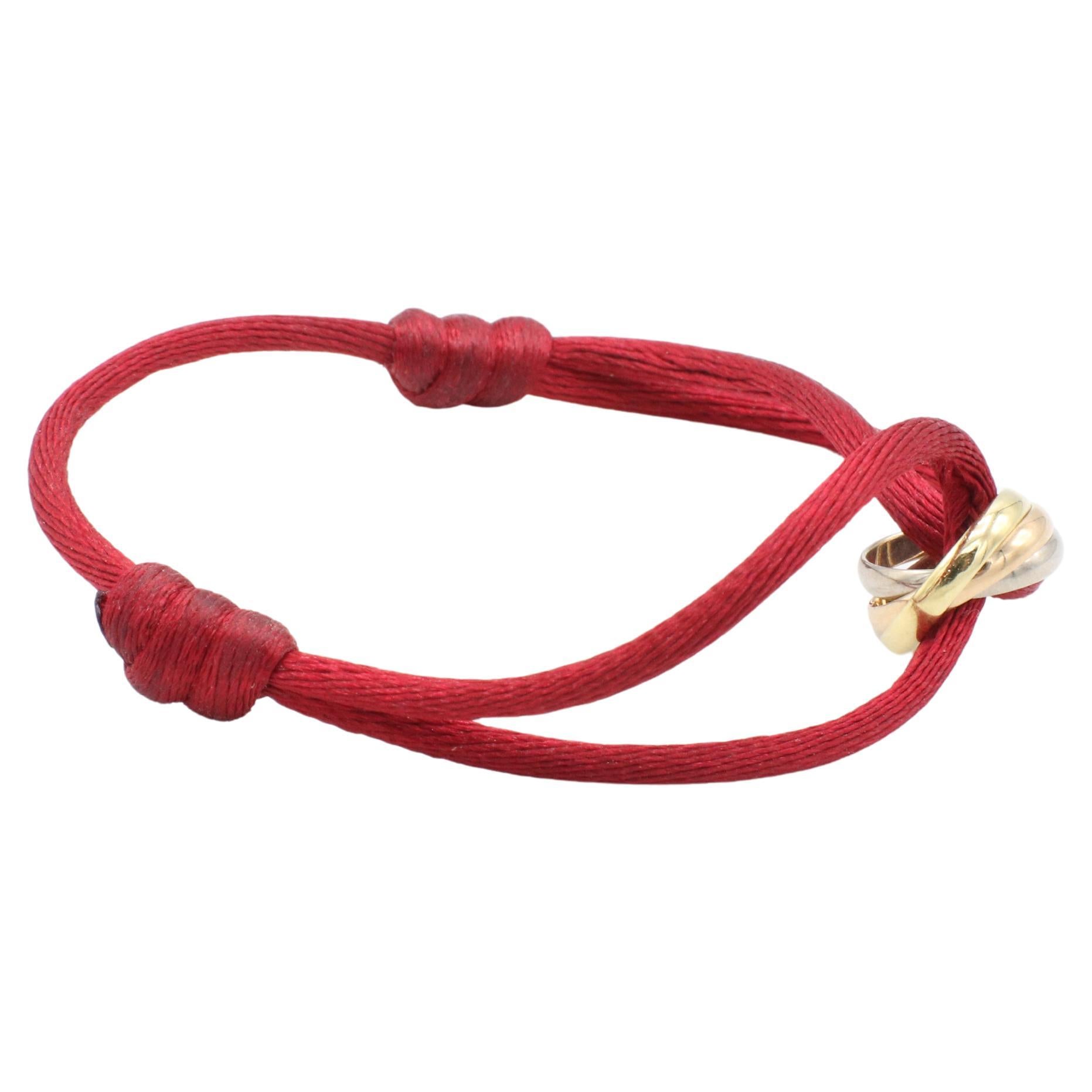 Cartier Trinity Tri-Color Rolling Bracelet on Adjustable Red Cord Box & Papers In Excellent Condition For Sale In  Baltimore, MD