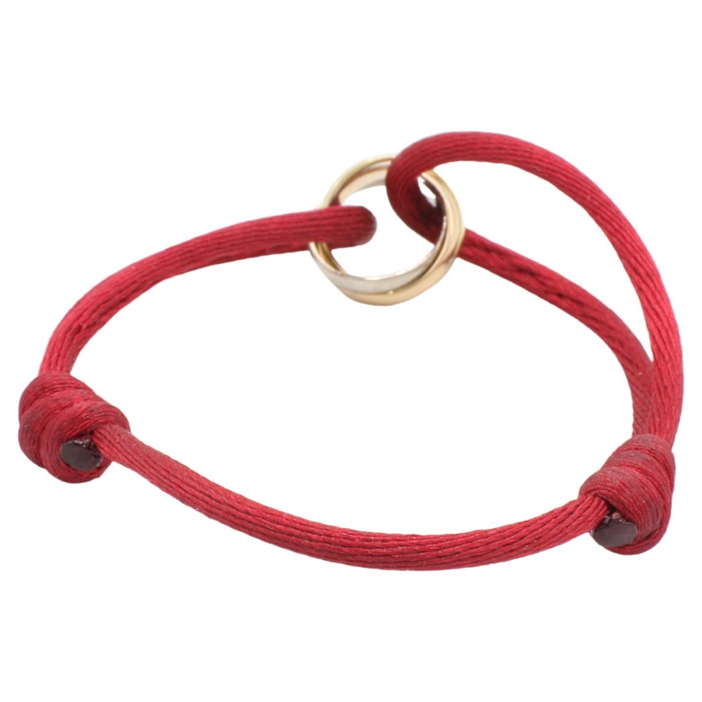 Women's or Men's Cartier Trinity Tri-Color Rolling Bracelet on Adjustable Red Cord Box & Papers For Sale