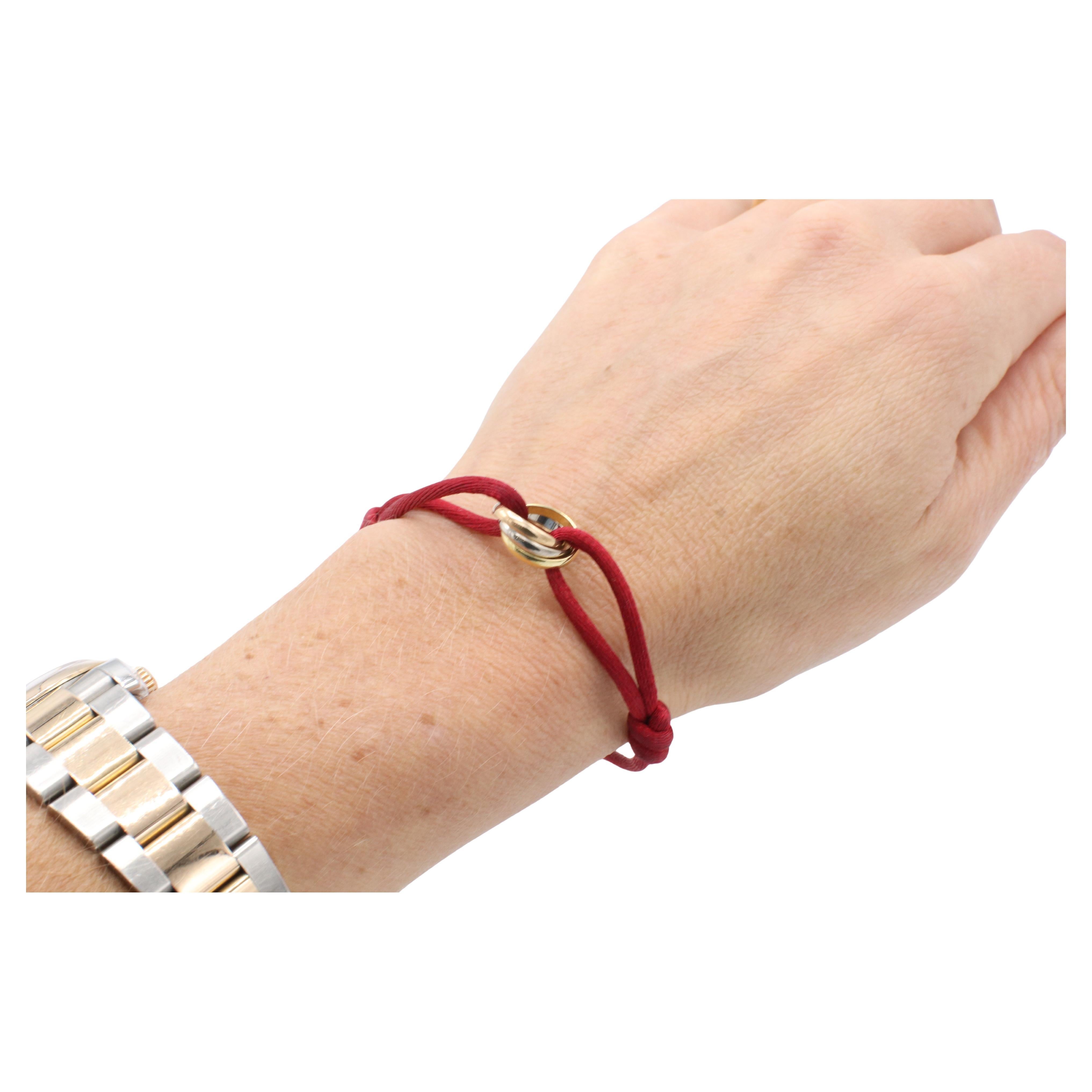 Cartier Trinity Tri-Color Rolling Bracelet on Adjustable Red Cord Box & Papers For Sale 1