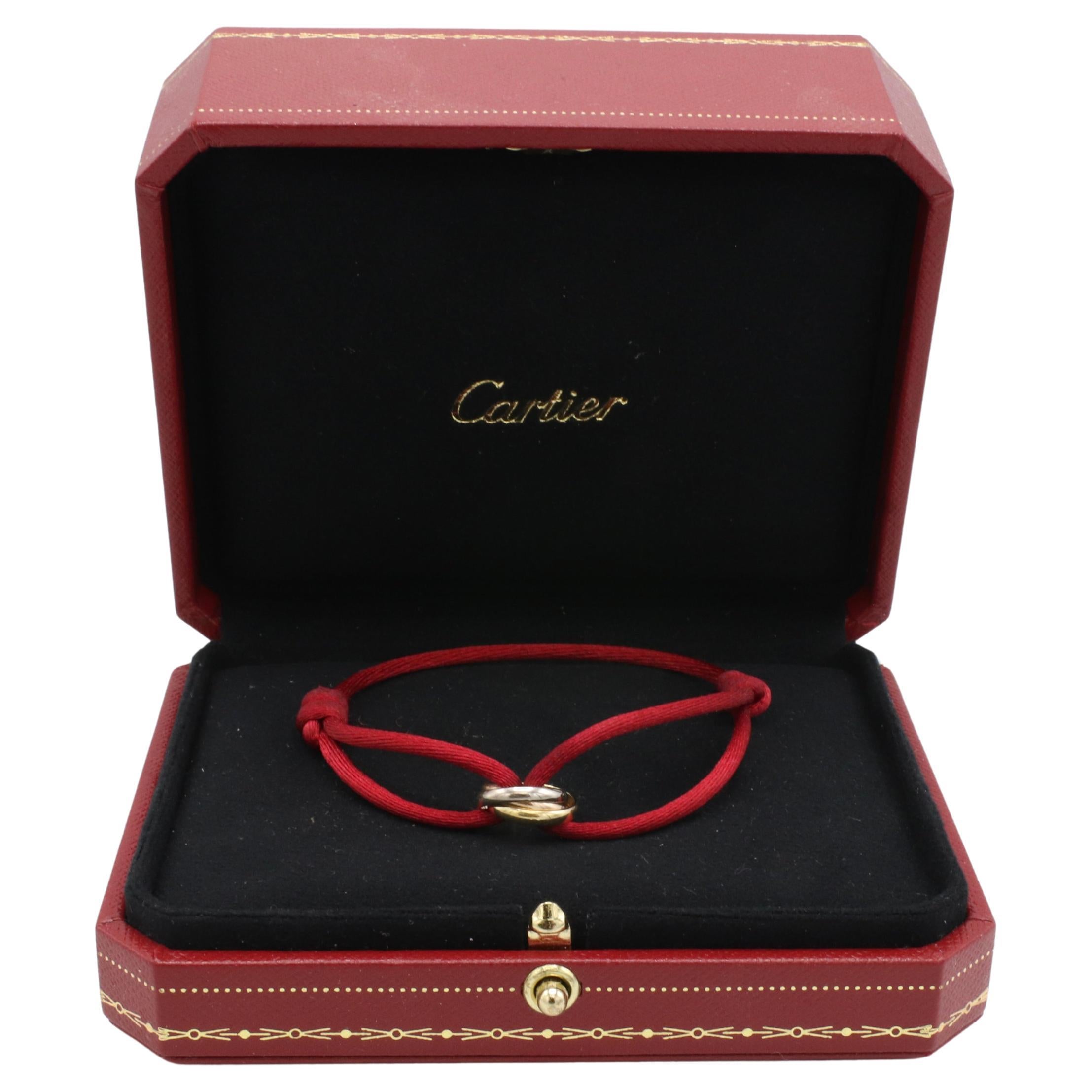 Cartier Trinity Tri-Color Rolling Bracelet on Adjustable Red Cord Box & Papers For Sale