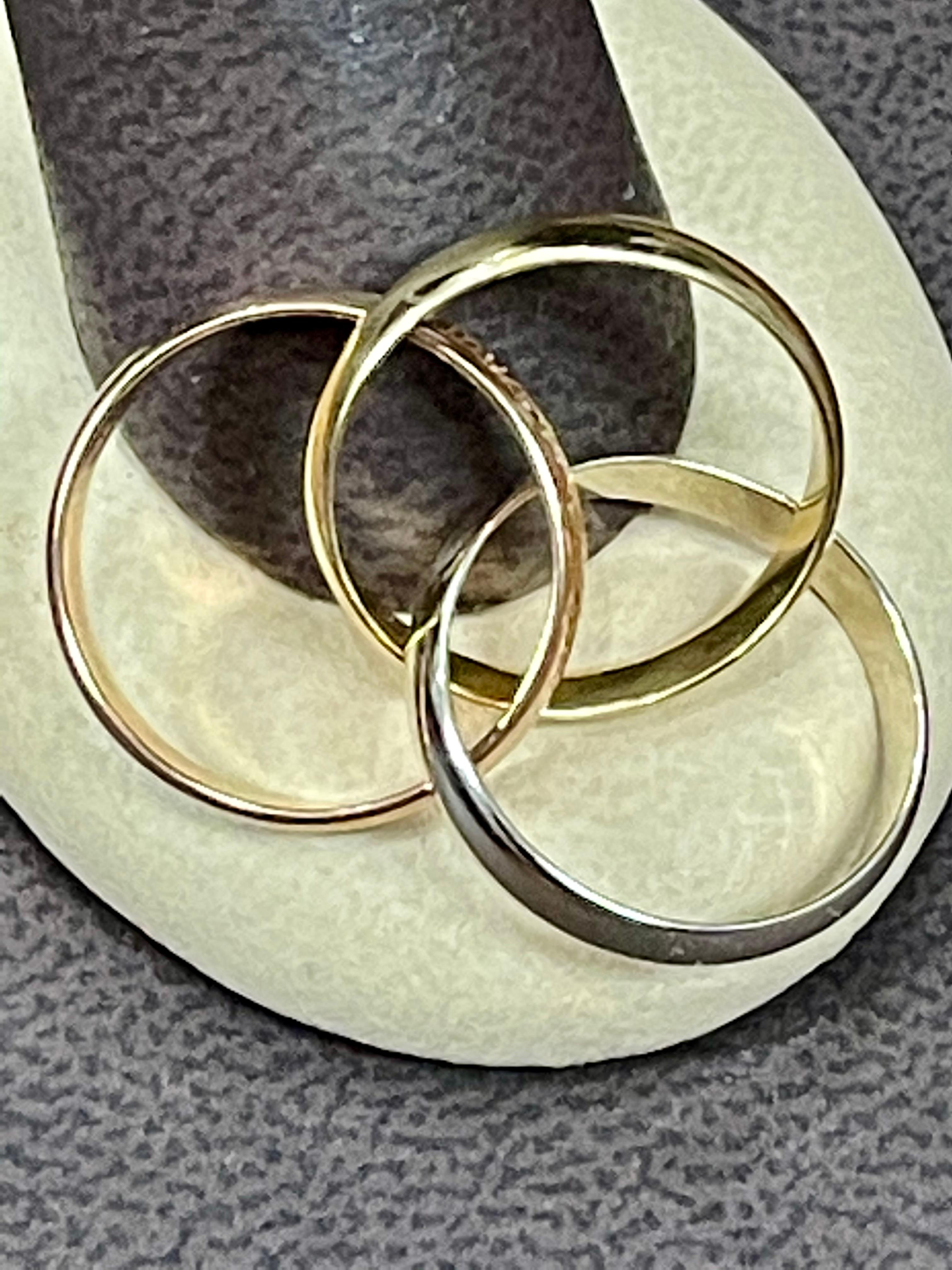 Cartier Trinity Tri-Color White, Yellow Rose, 18 Karat Gold Rolling Rings In Excellent Condition In New York, NY