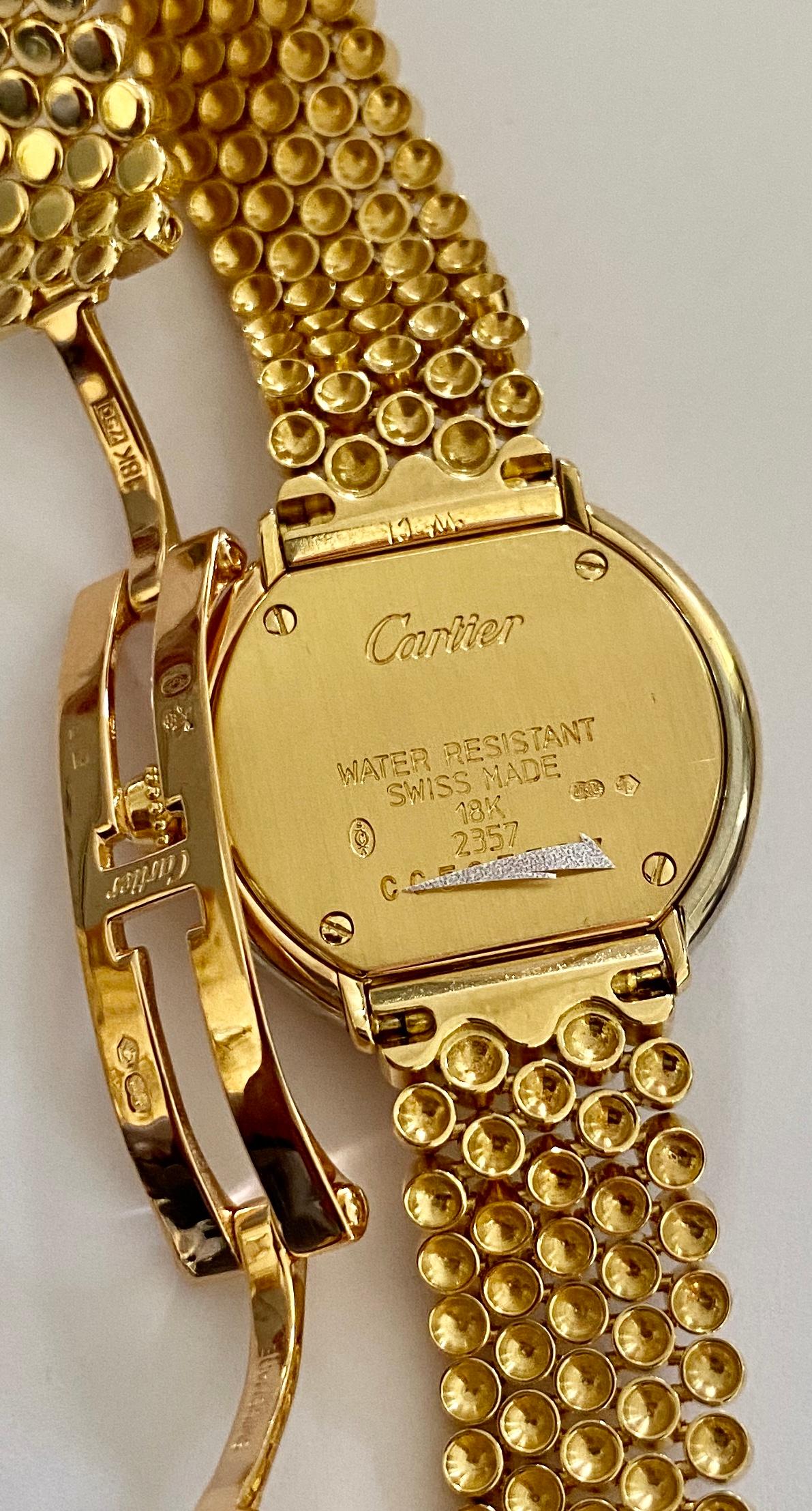 Cartier, Trinity Watch in 18 Karat Gold 33 Diamonds and a 18 Karat Gold Bracelet 2
