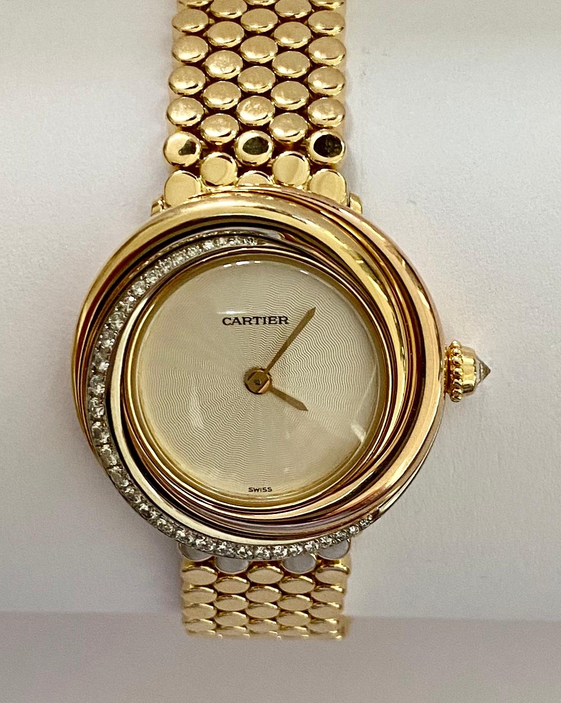 cartier trinity watch with diamonds