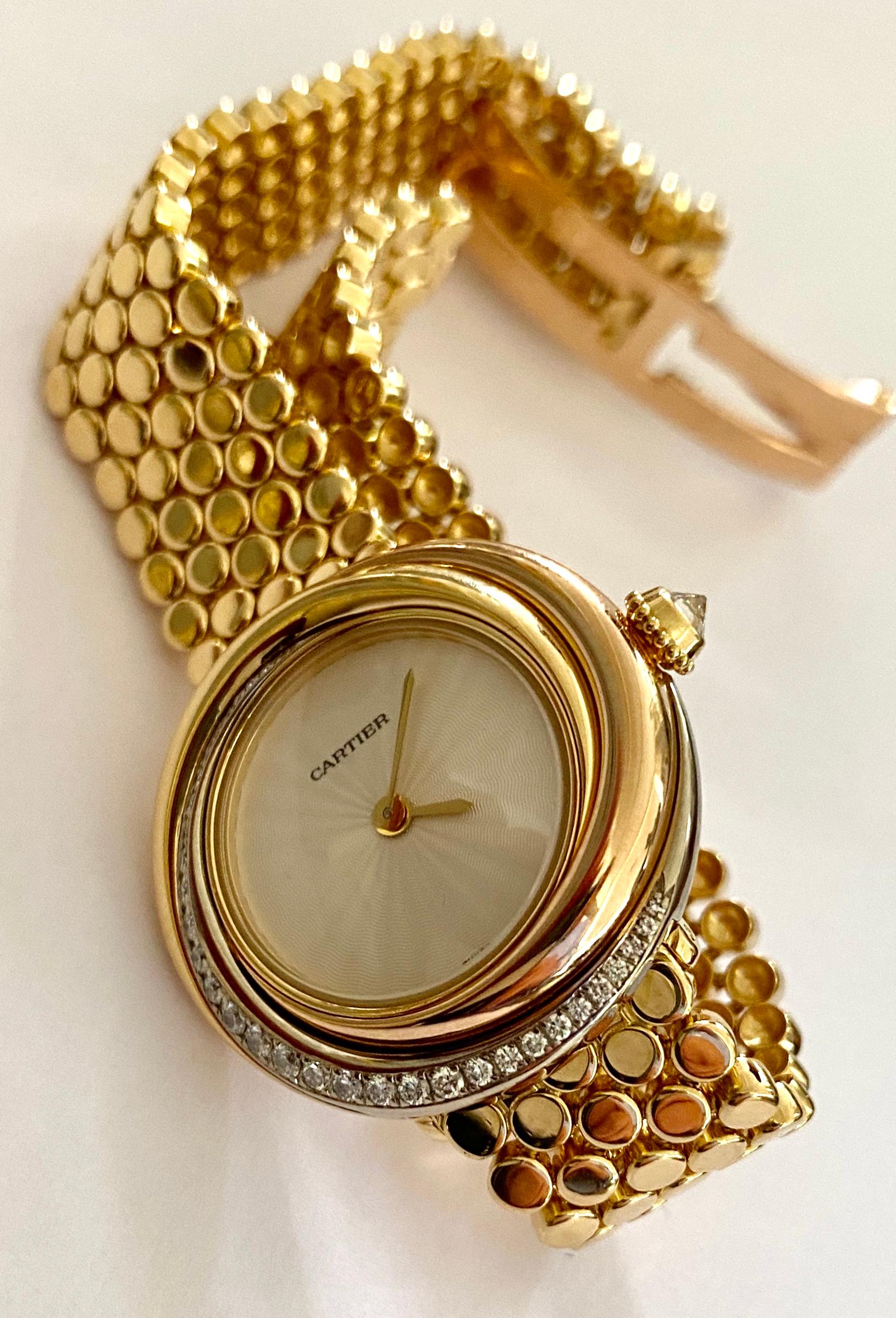 Briolette Cut Cartier, Trinity Watch in 18 Karat Gold 33 Diamonds and a 18 Karat Gold Bracelet