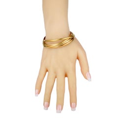 Cartier Trinity White, Yellow and Rose Gold Rolling Bangle Bracelet