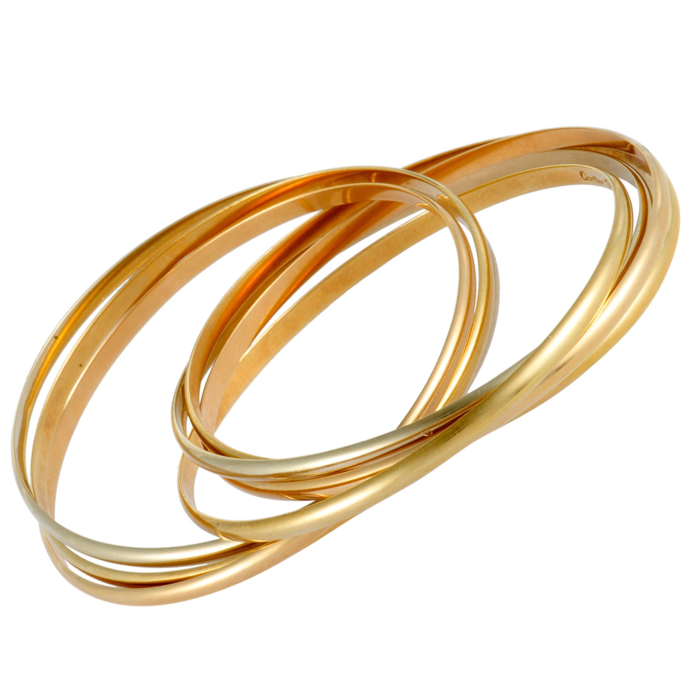 Cartier Trinity White, Yellow and Rose Gold Rolling Bangle Bracelet In Excellent Condition In Southampton, PA