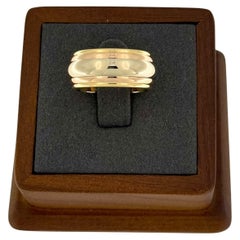 Cartier Anello a fascia cinetica in oro triplo