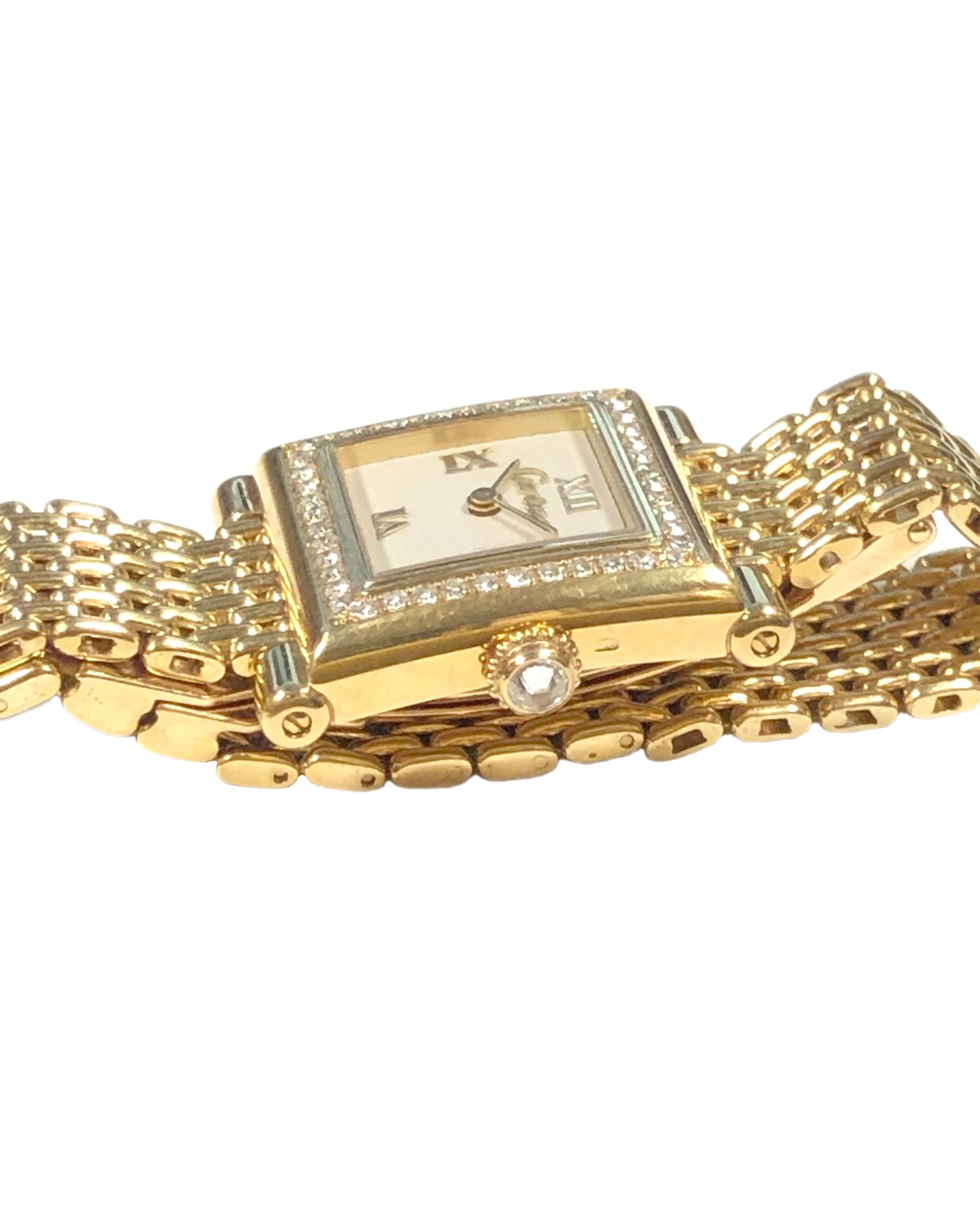 Circa 1987 Cartier Trocadero Ladies Wrist Watch, this model was a very limited offering also called Boutique collection and extremely hard to find. 24 X 20 M.M. 18K Yellow Gold 2 piece case with Diamond set bezel and Diamond set crown. Quartz