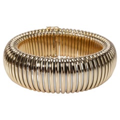 Cartier Tubogas-Armband aus 18 Karat Gelbgold und Edelstahl