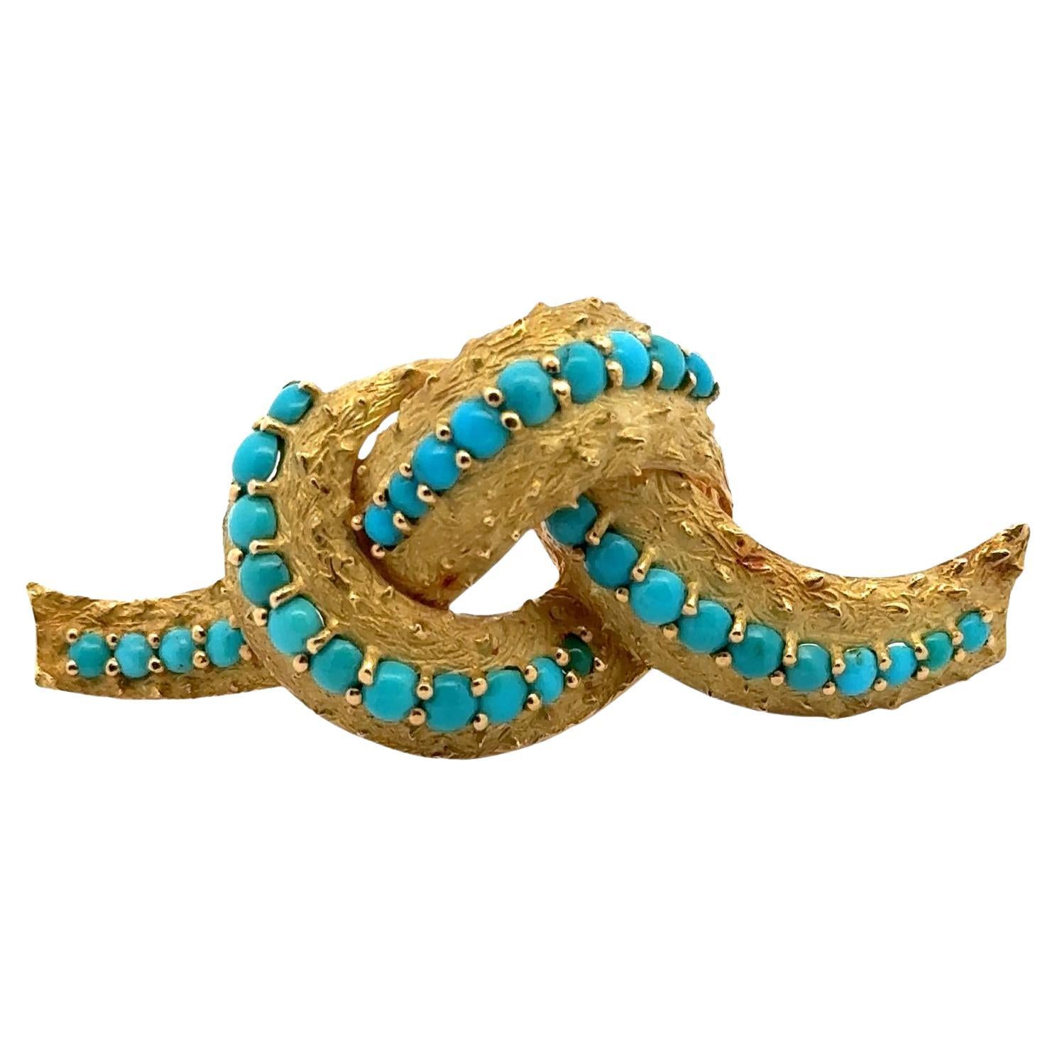 Cartier Broche nœud vintage en or jaune texturé 18 carats et turquoise