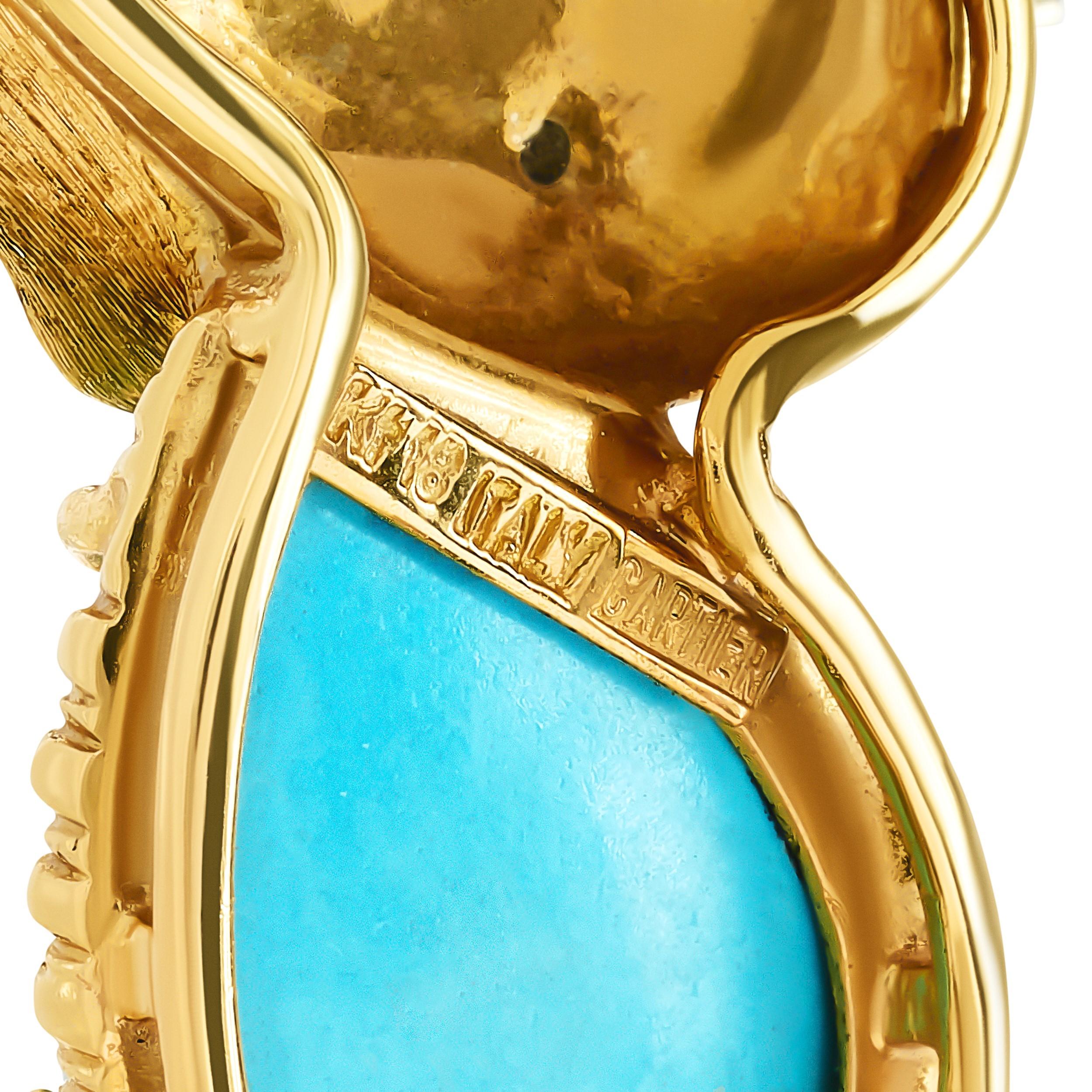 This Cartier pin features a playful cat, masterfully crafted in gold and adorned with vibrant turquoise.

Numbered and signed Cartier.
