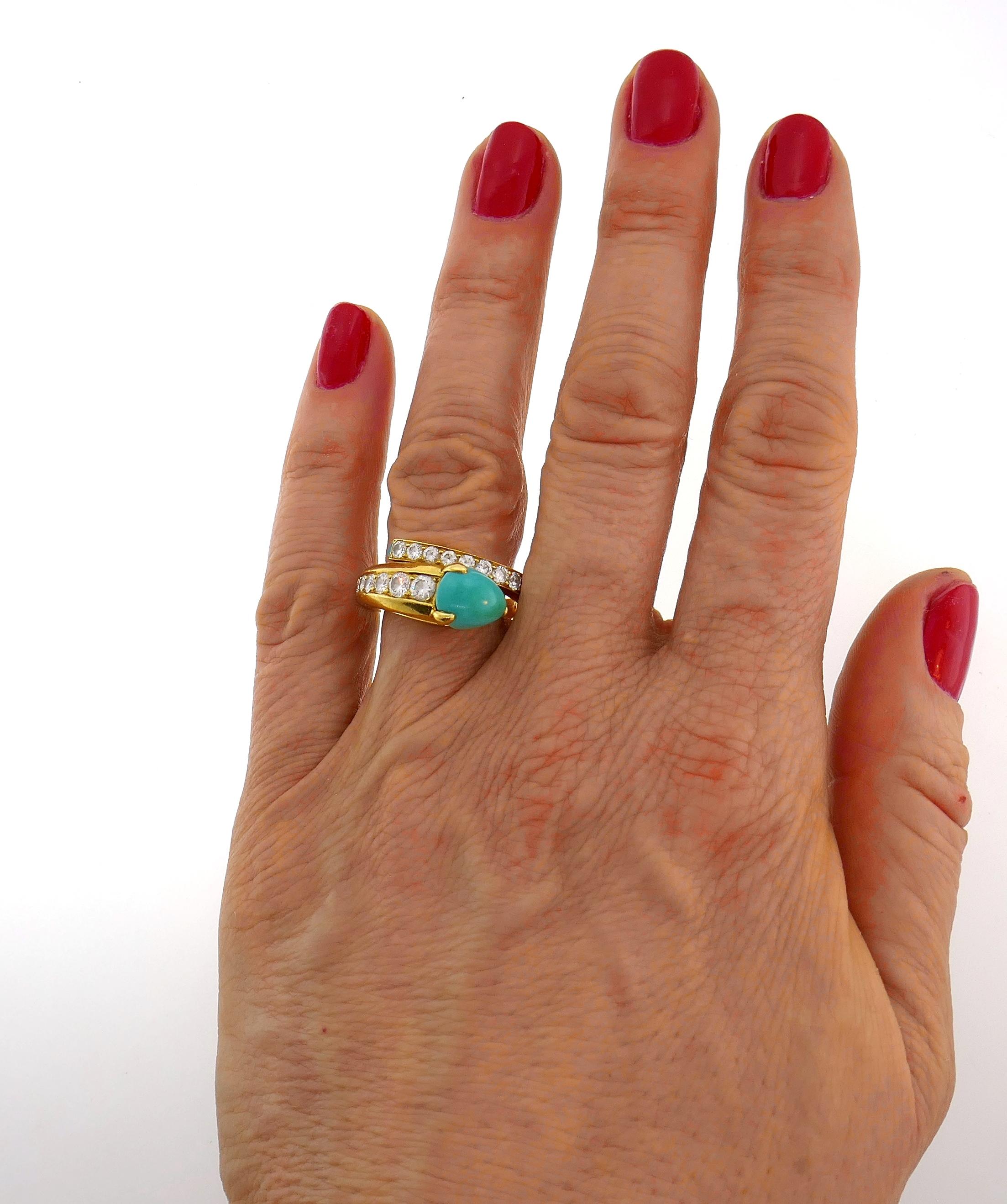 Stunning cocktail ring created by Cartier in France in the 1980s. It is designed as a stylized snake. The ring is made of  18 karat yellow gold, turquoise and round brilliant cut diamonds (F-G color, VS1 clarity, total weight approximately 1.0