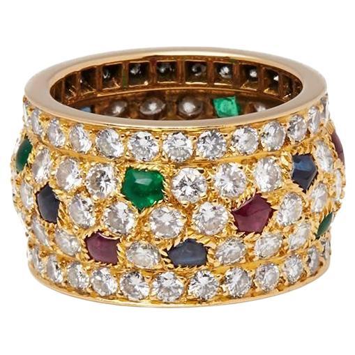 Introducing the CARTIER Tutti Frutti 4.5 Carats Emerald Sapphire Ruby Diamond Nigeria Ring, a spectacular fusion of color and elegance. Crafted by Cartier, this ring exudes luxury and sophistication. Featuring a vibrant array of emeralds, sapphires,