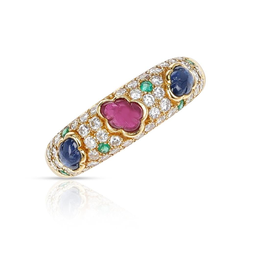 A Cartier Tutti Frutti Ruby, Emerald, Sapphire, Diamond Ring made in 18 Karat Yellow Gold. The ring size is US 8. The total weight of the ring is 6.49 grams. 
