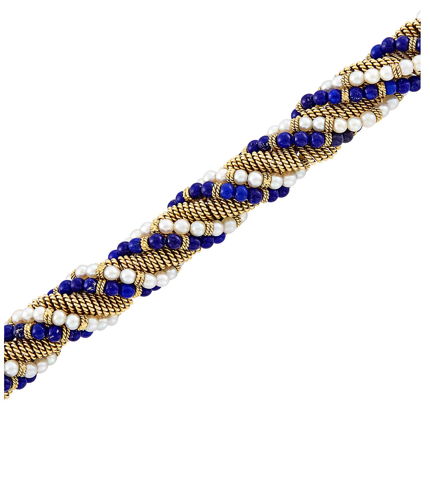 Cartier 18 karat gold bracelet composed of a rope-twist wire mesh, lined with spirals of Lapis beads approximately 3.3 to 3.2 mm., and Cultured Pearls approximately 3.3 to 3.0 mm separated with 3.0mm rope rondells signed Cartier, Italy, no. 55508,