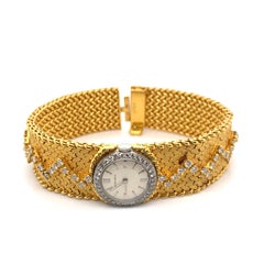 Cartier, Two-Color Gold and Diamond Bracelet Watch, Longines