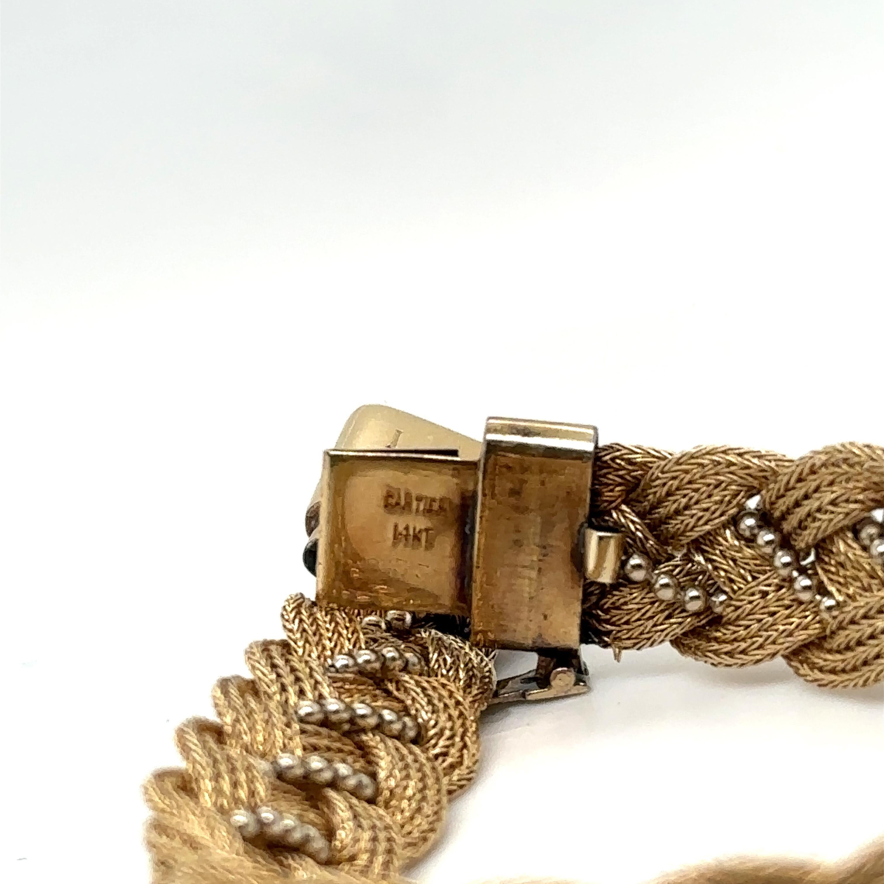Cartier Two-Color Gold Braided Bracelet 1960s with Original Box In Good Condition In New York, NY