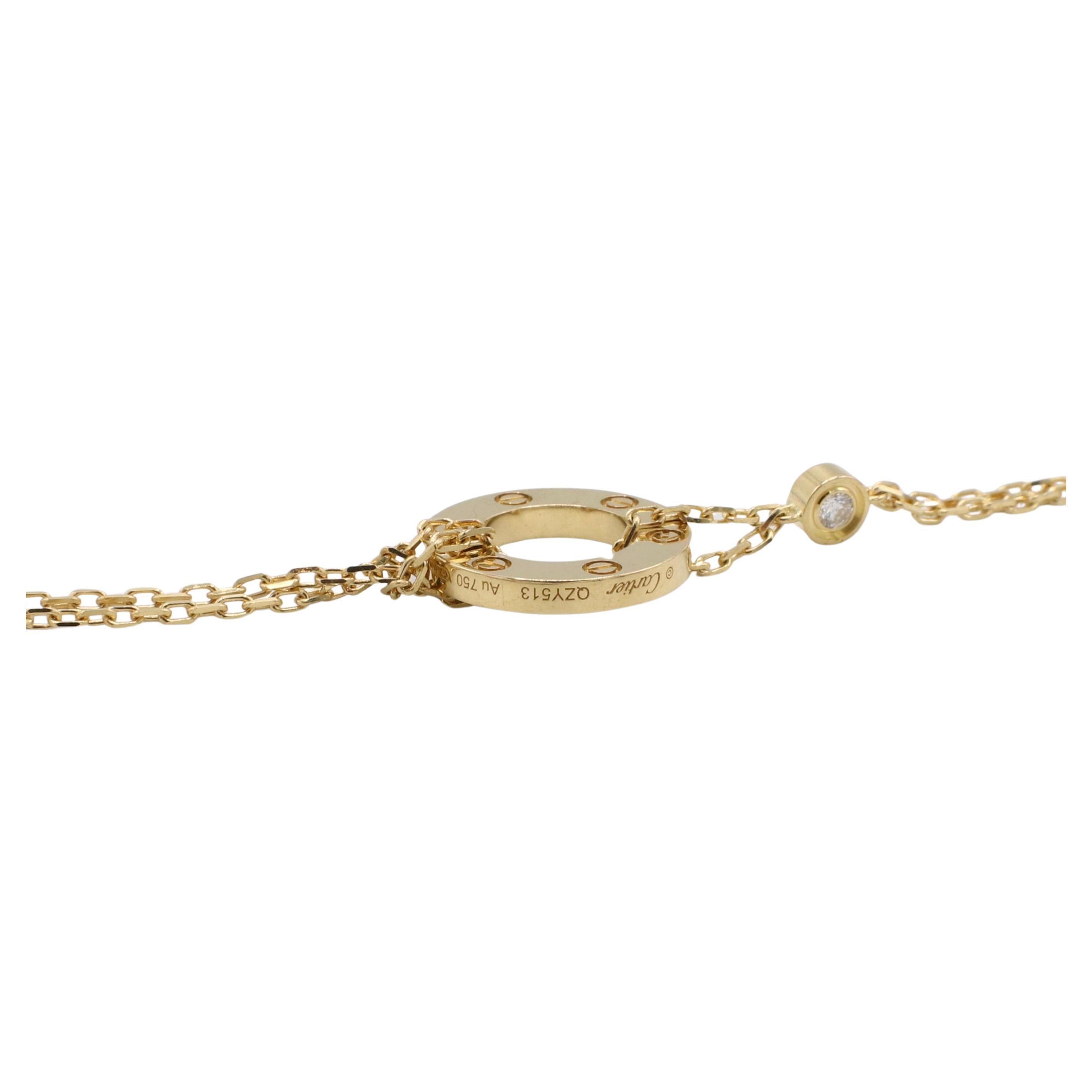 Cartier: 18 Karat Gelbgold Love-Halskette mit zwei Diamanten  (Rundschliff) im Angebot