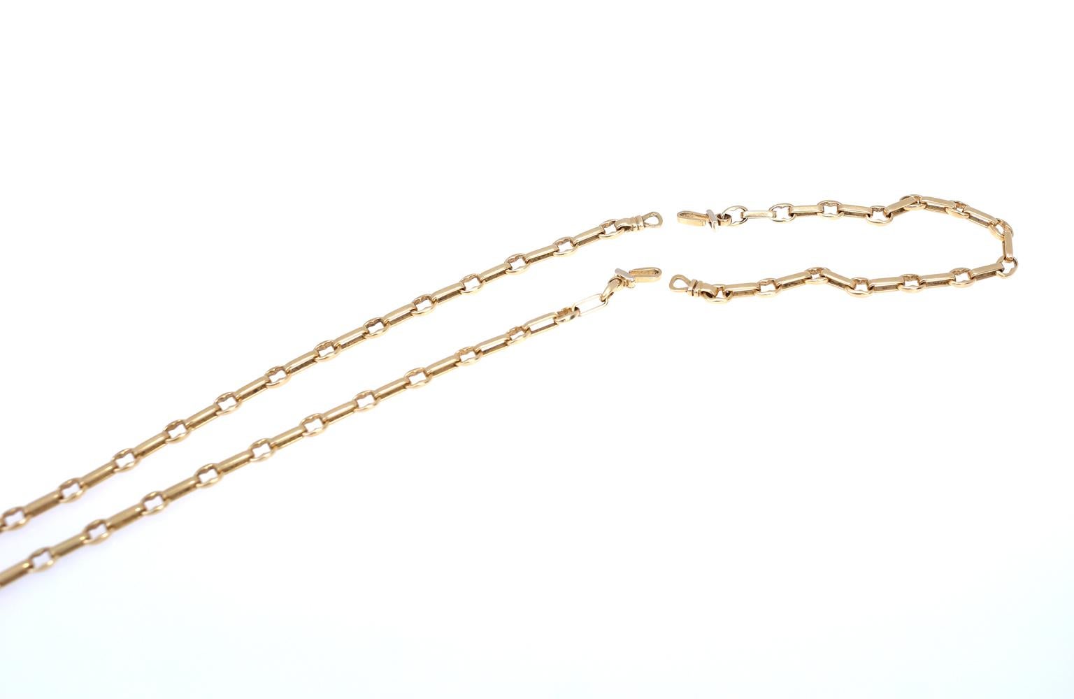 Chaîne deux pièces en or 18 carats de Cartier signée:: 2000 2