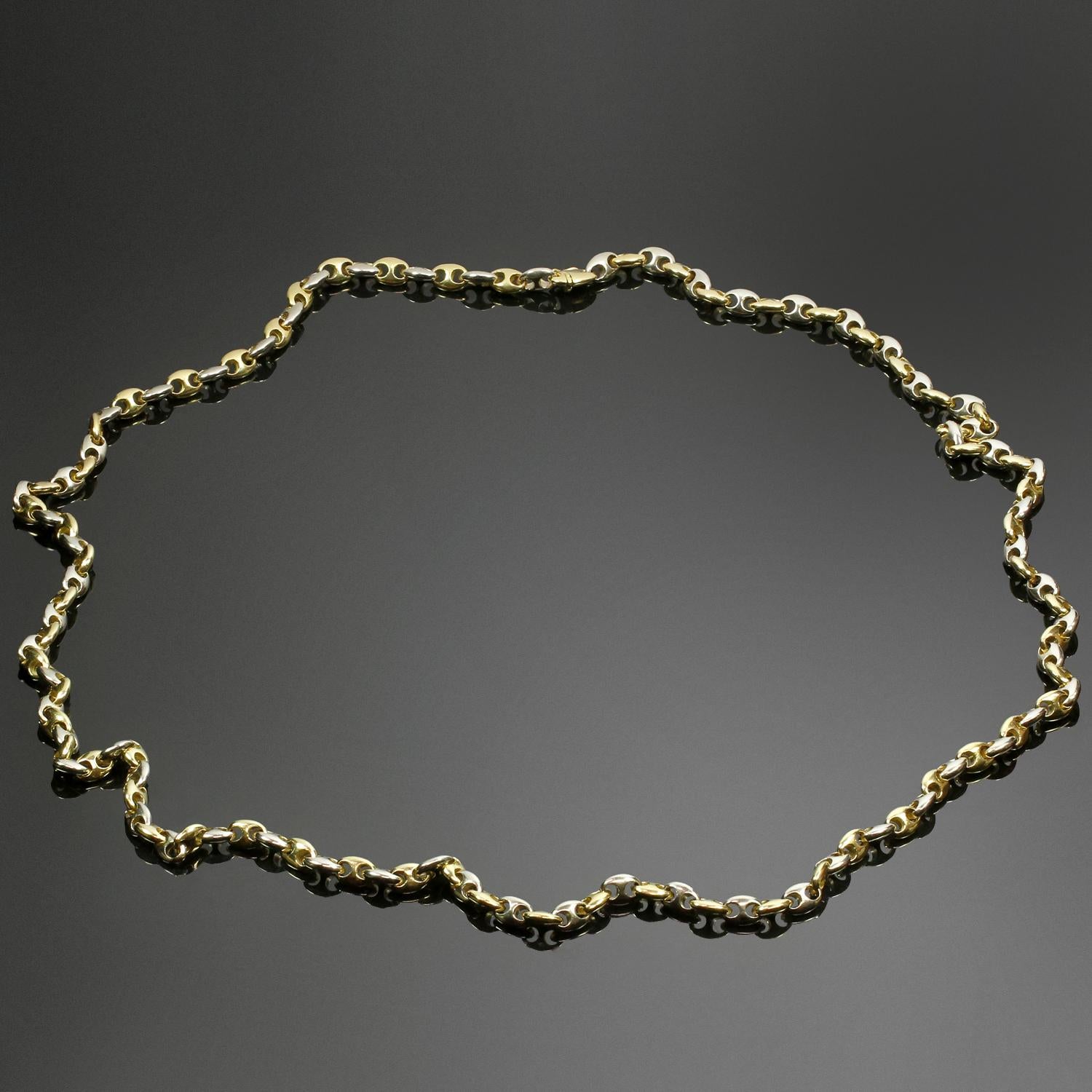 This chic unisex Cartier necklace features a long chain of mariner links crafted in 18k white and yellow gold. Circa 1990s. Measurements: 0.27