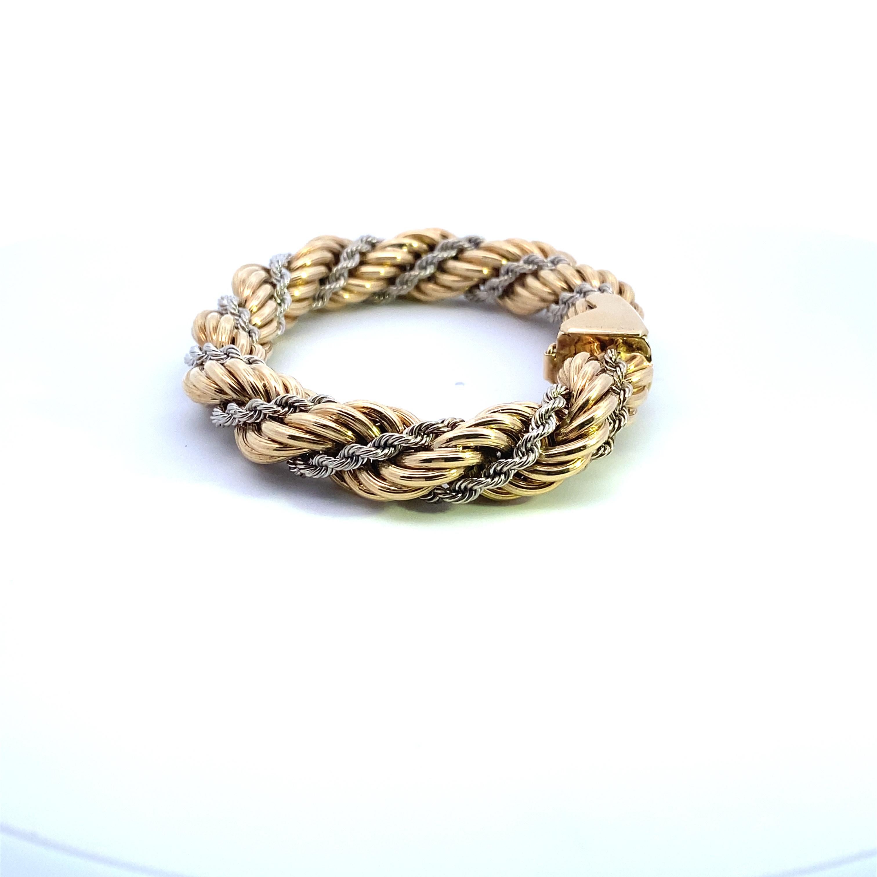 Cartier Two-Tone Gold Twisted 12mm Rope Bracelet with box clasp and safety-eight. Circa 1980's estate. 205mm/8